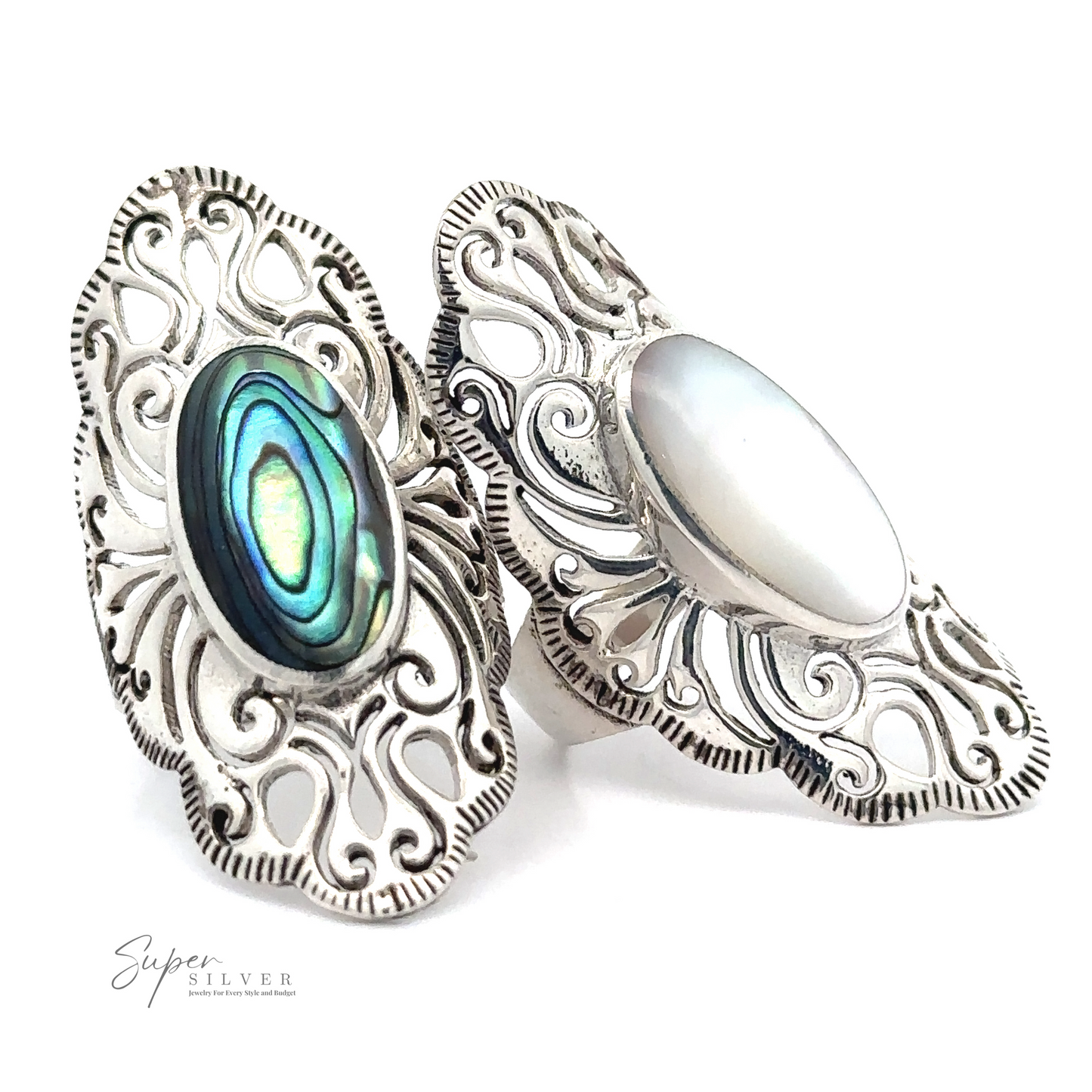 Two Long Vintage-Inspired Filigree Rings With Inlaid Stone exude vintage charm. One features an iridescent abalone shell, while the other has an oval white stone, both offering standout jewelry pieces that captivate the eye.