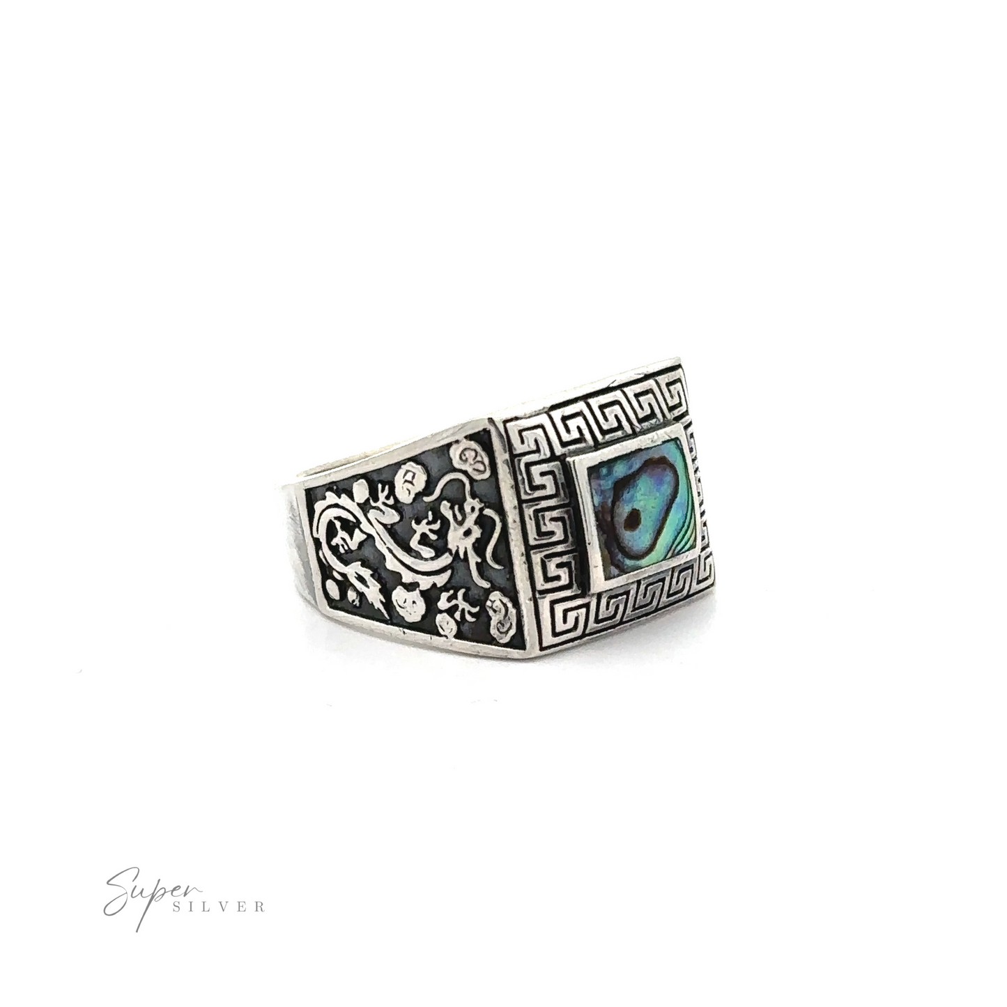 
                  
                    A statement Stone Signet Ring with Dragon Design featuring an abalone shell inlay.
                  
                