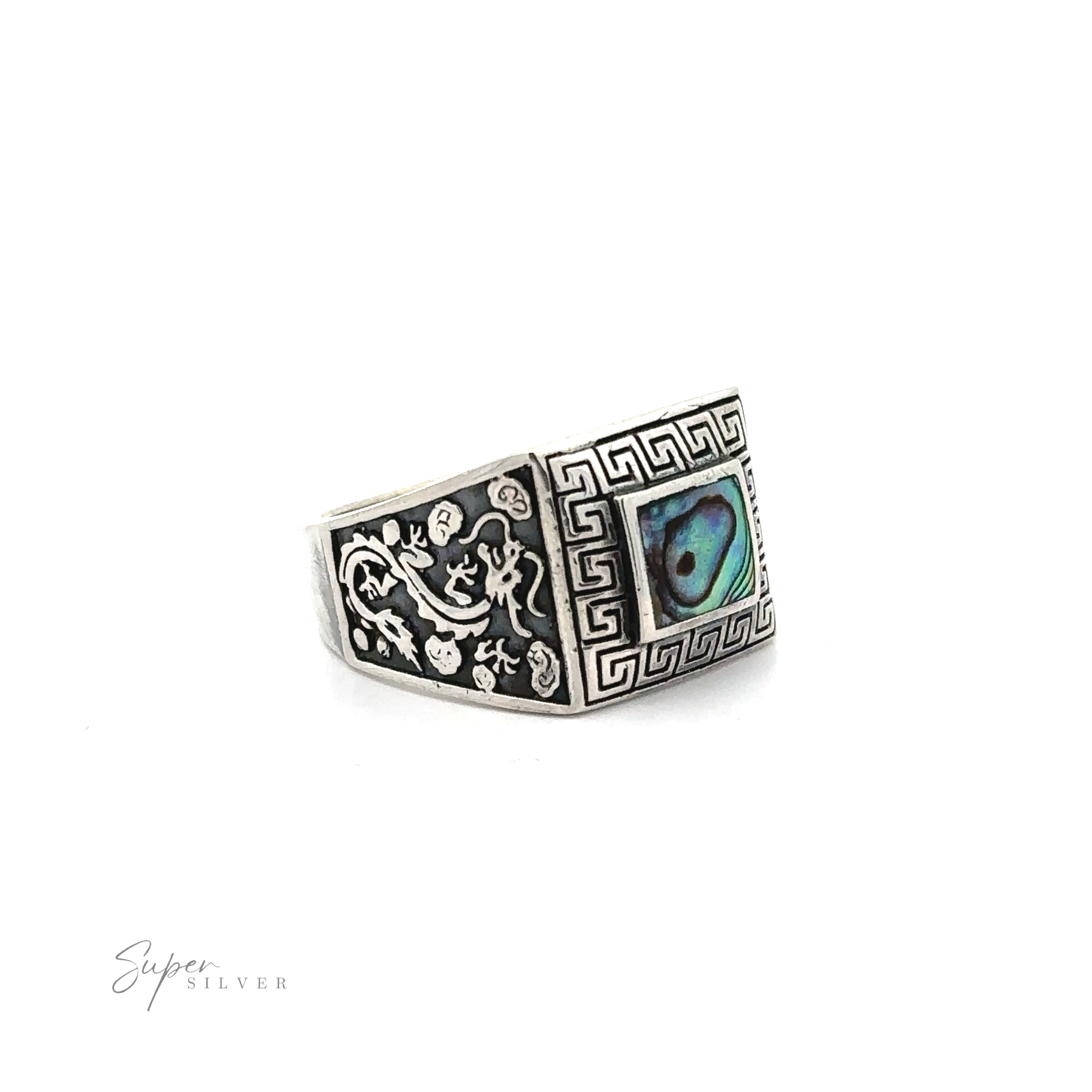 A statement Stone Signet Ring with Dragon Design featuring an abalone shell inlay.