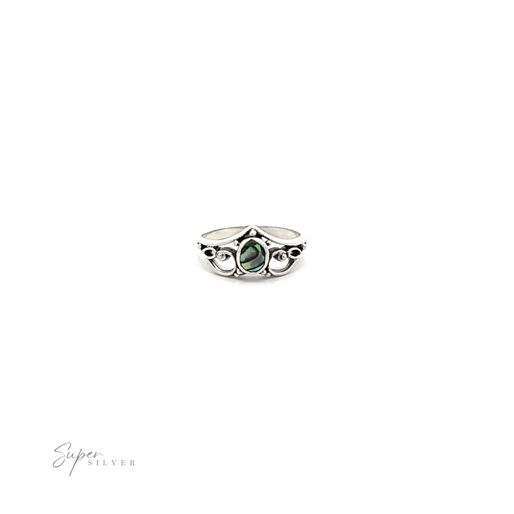 
                  
                    A delicate Filigree Crown Ring with Inlaid Oval Stone, exuding a vintage vibe.
                  
                