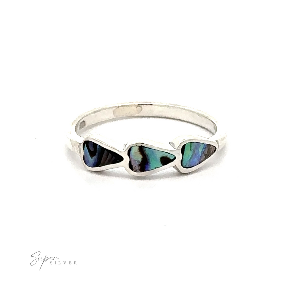 
                  
                    A sterling silver ring with three heart-shaped abana shells.
Product Name: Triple Heart Ring with Inlaid Stones
                  
                