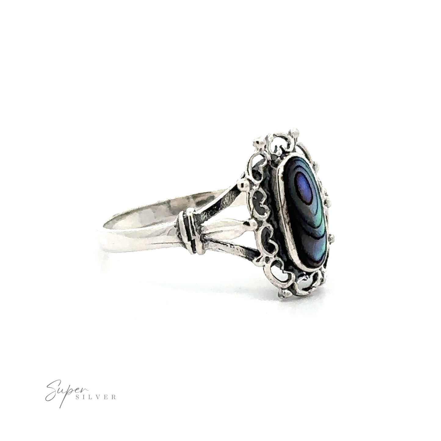 
                  
                    A Inlaid Oval Ring with Filigree Heart Border with abalone shell, giving it a vintage appeal.
                  
                