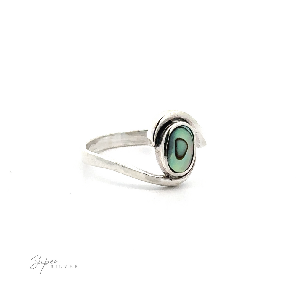 
                  
                    A Simple Freeform Ring with Oval Inlaid Stones with a green stone on it.
                  
                