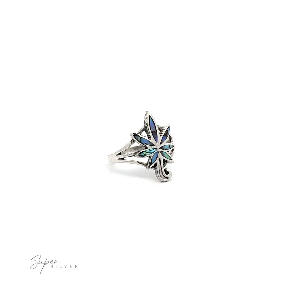 
                  
                    A colorful Inlay Stone Marijuana Leaf Ring crafted from .925 Sterling Silver with blue and green stones.
                  
                