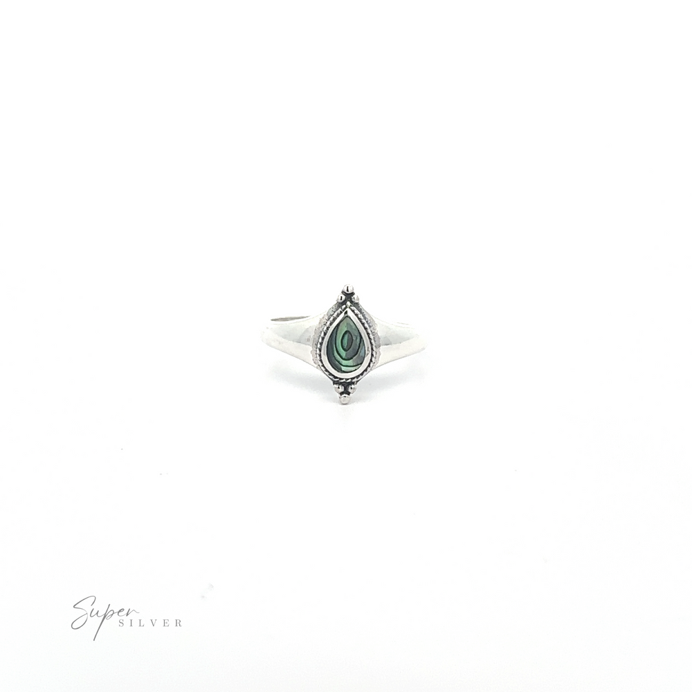 
                  
                    A Teardrop Inlay Shield Ring with a tear-drop shaped black and white stone, isolated on a white background.
                  
                