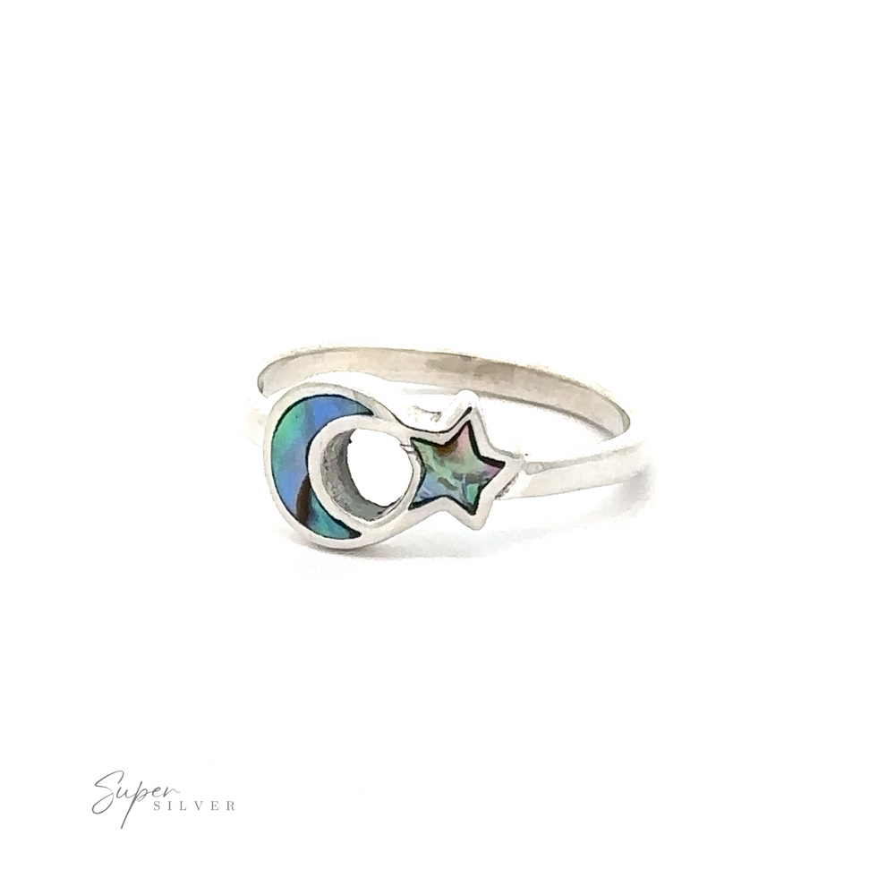 
                  
                    A Crescent Moon And Star Ring with inlaid stones featuring a crescent moon and star design.
                  
                