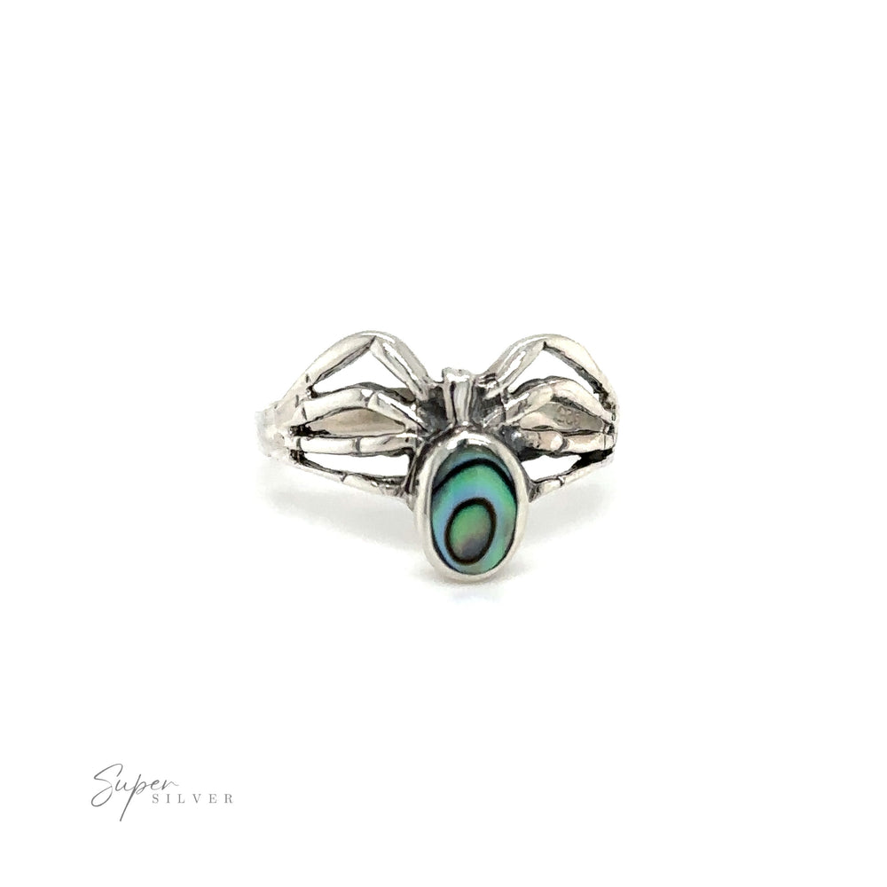 
                  
                    A mystical Inlay Stone Spider Ring from Super Silver with an enchanting abalone shell on it.
                  
                