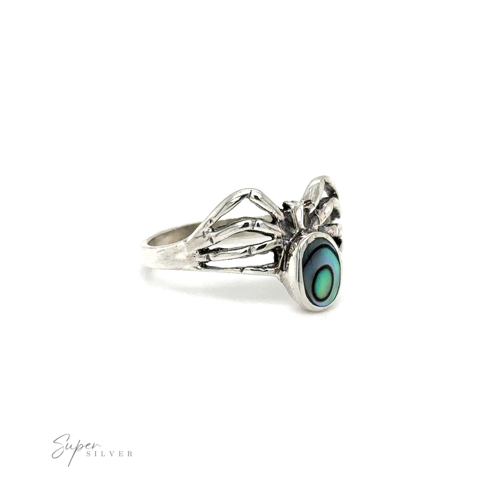 
                  
                    A mystical Super Silver Inlay Stone Spider ring with an enchantress abalone stone.
                  
                