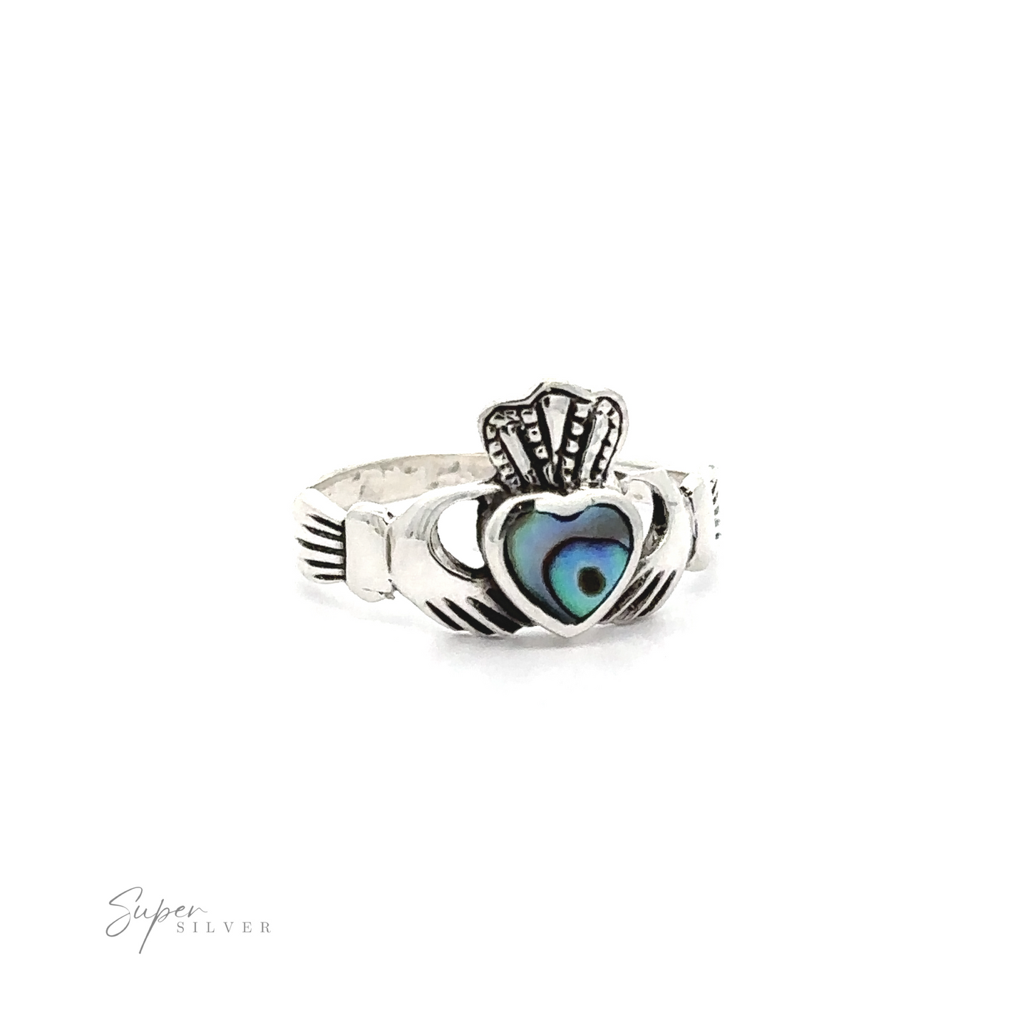 
                  
                    Claddagh Inlaid Stone Ring featuring a heart-shaped blue gemstone, with hands and a crowned heart design symbolizing Irish heritage, presented against a white background.
                  
                