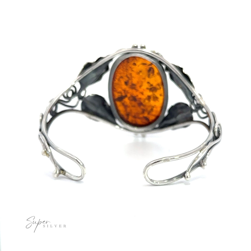 
                  
                    A contemporary design Exquisite Amber Floral Cuff with an Amber stone.
                  
                