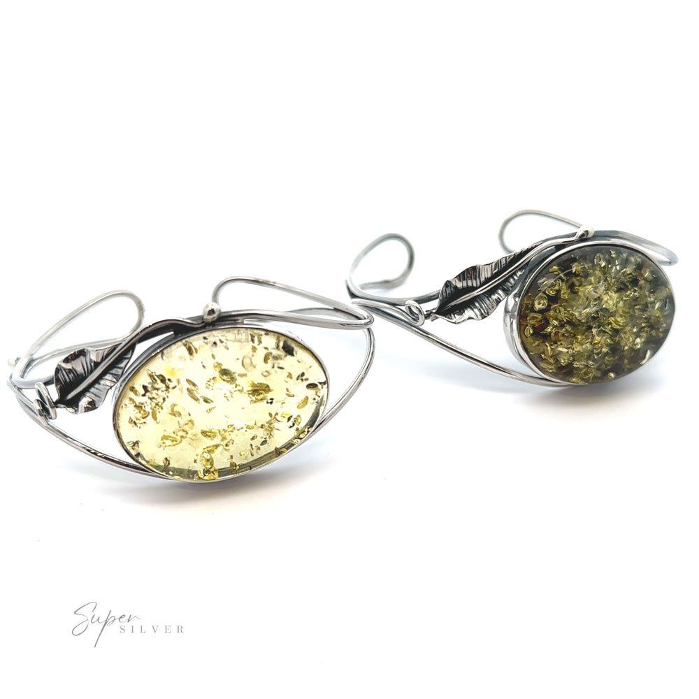 A pair of Delicate Floral Amber Cuff earrings with a statement design.