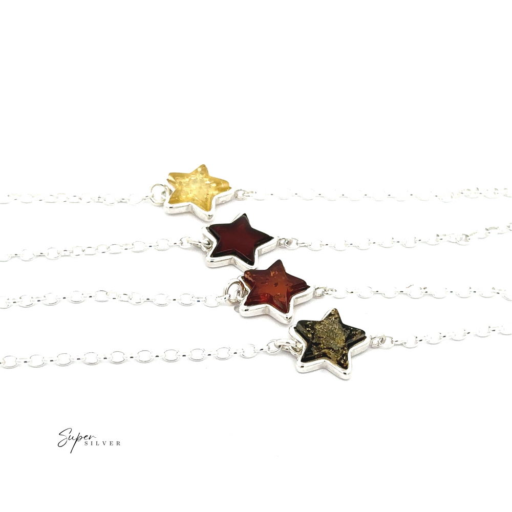 
                  
                    The Simple Amber Star Bracelet showcases a minimalist sterling silver chain adorned with star-shaped pendants in yellow, red, brown, and black tones, adding a touch of refinement.
                  
                