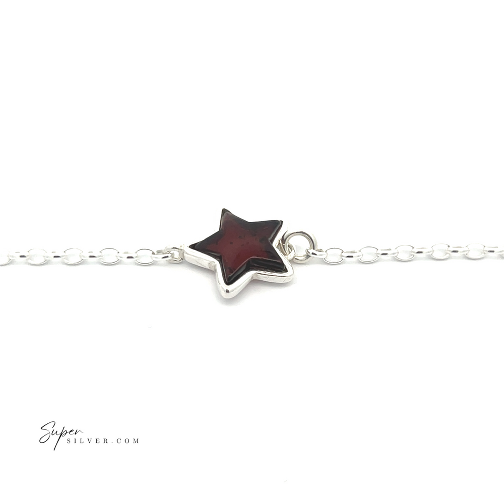 
                  
                    Simple Amber Star Bracelet featuring a minimalist silver chain adorned with a red celestial star-shaped charm, showcased against a white background.
                  
                