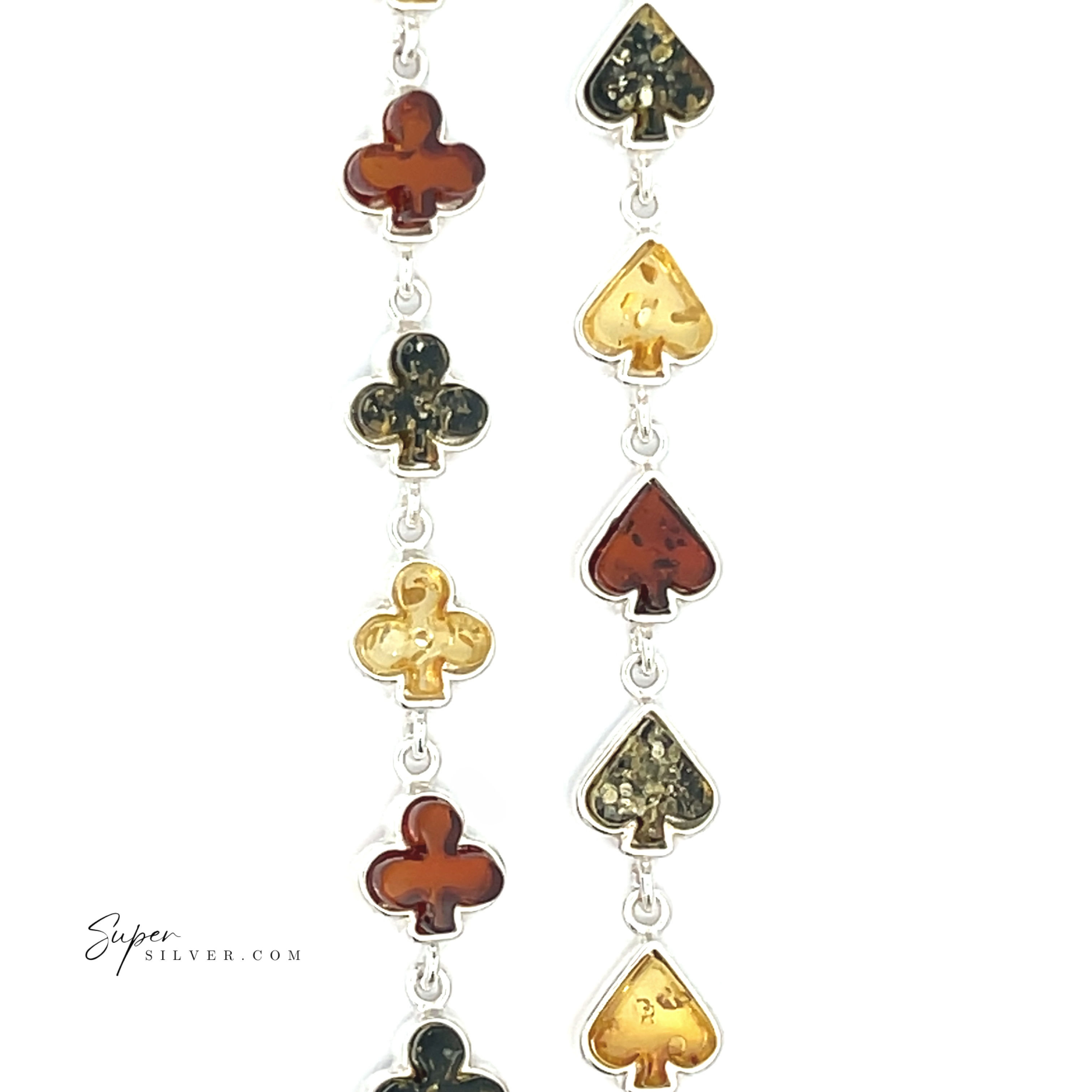 Amber Card Suit Bracelets: Sterling silver bracelet with alternating club and spade shapes, each filled with yellow, green, or brown Baltic amber—a distinctive card suit jewelry piece.