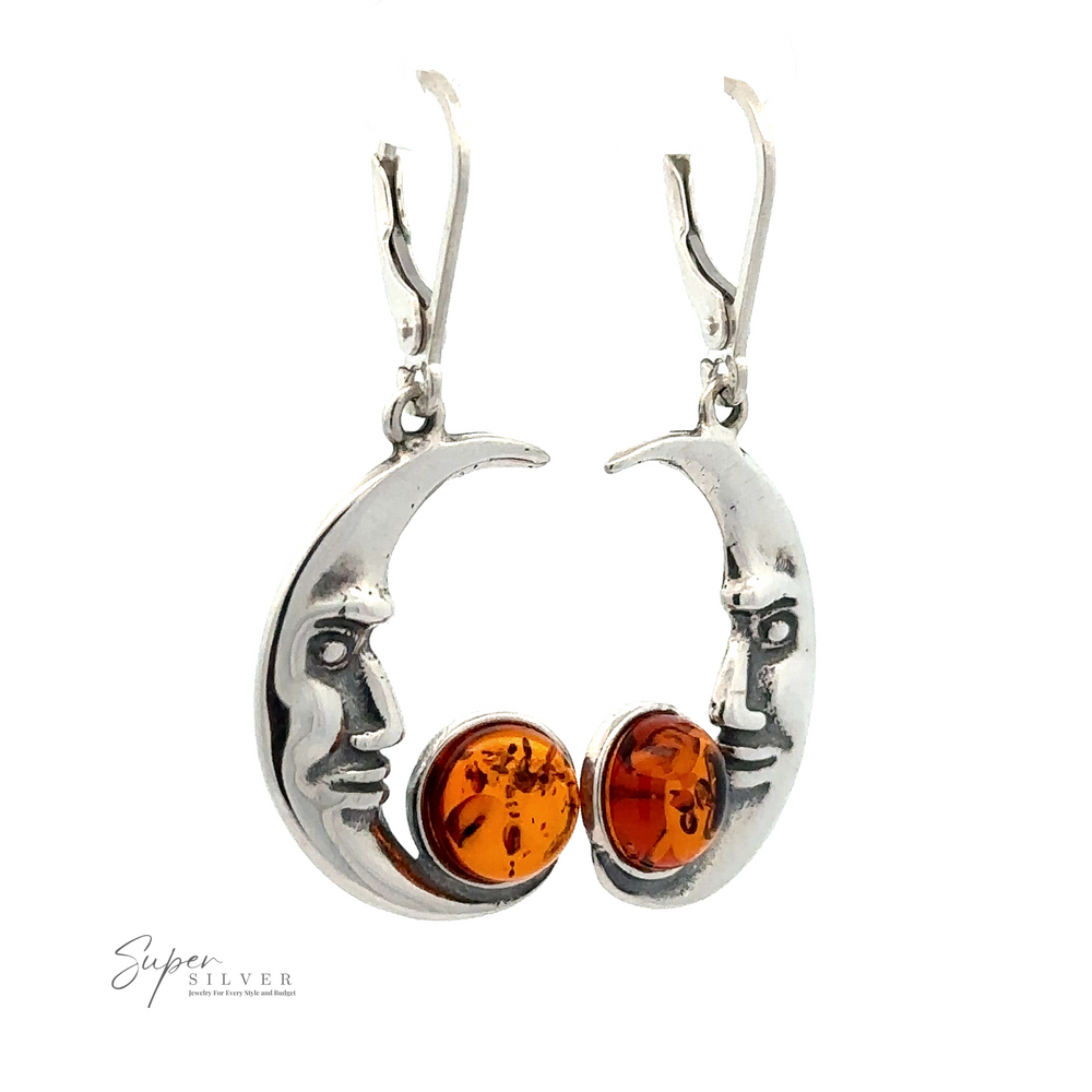 Amber Man-in-the-Moon Earrings designed by Super Silver, each clutching a stunning piece of Baltic amber at the center.