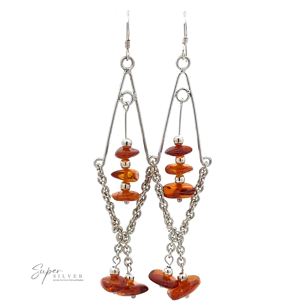 Beaded Amber Tassel Earrings adorned with orange beads and chains, showcasing a beaded tassel design and displaying the brand "Super Silver" in the bottom left corner.