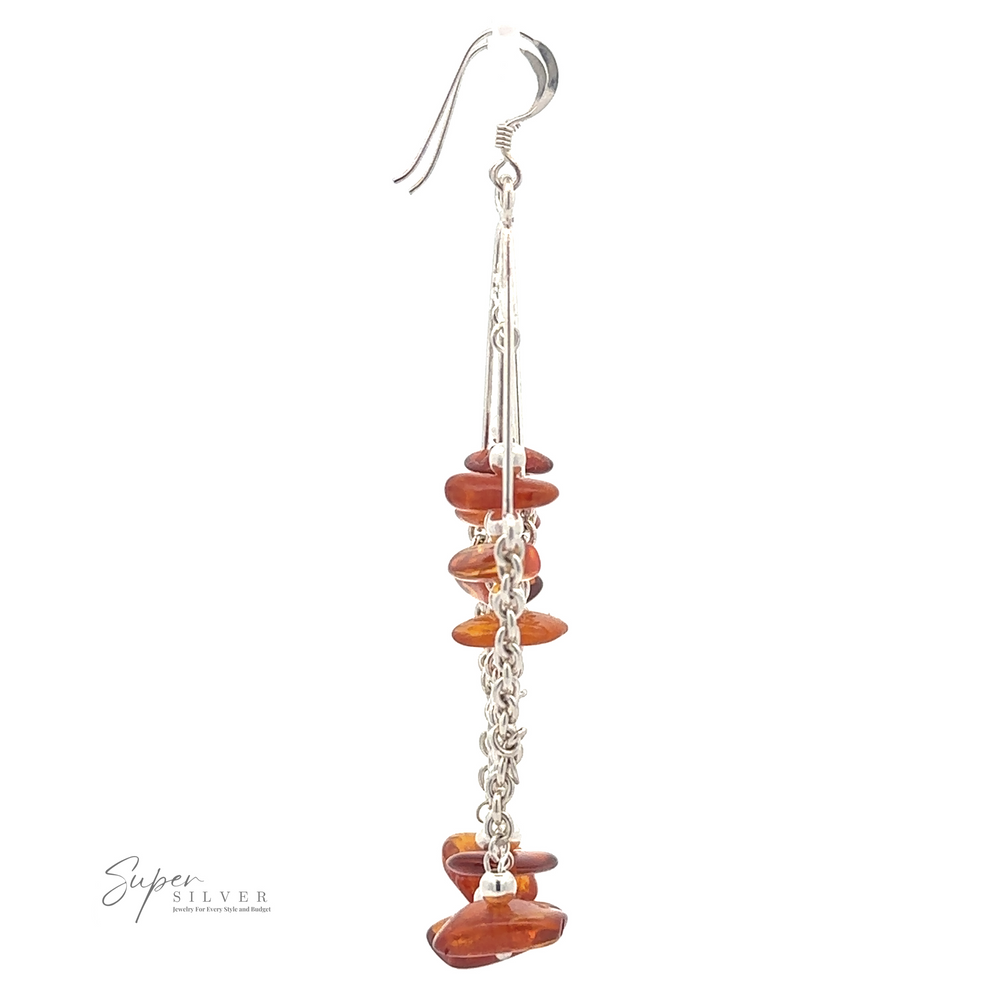 
                  
                    Beaded Amber Tassel Earrings with dangling red stones and chain links, embodying an earthy beaded tassel design, against a plain white background with "Super Silver" logo in the bottom left corner.
                  
                