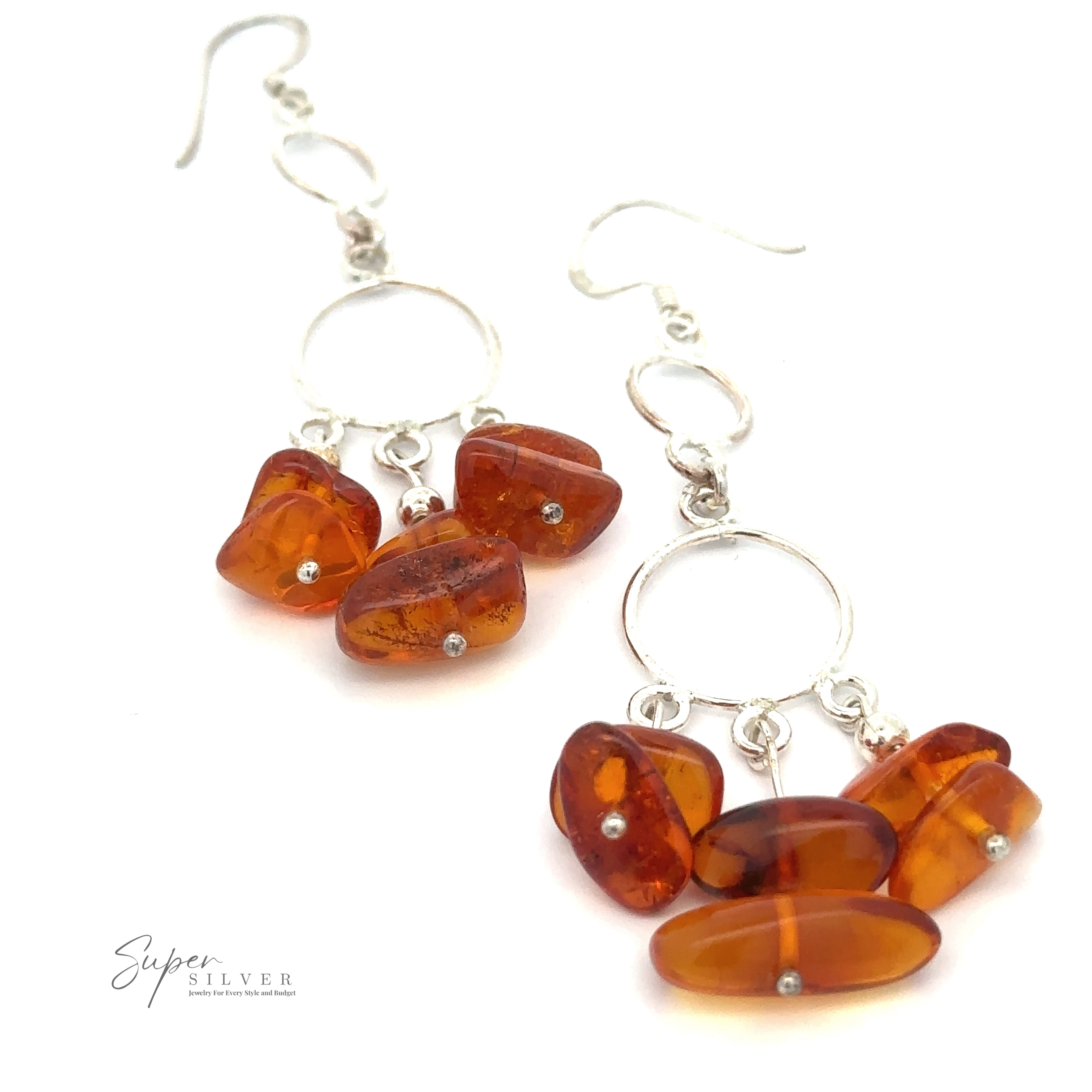 A pair of Hoop Dangle Earrings with Amber featuring multiple Baltic Amber stones attached to sterling silver rings. The logo "Super Silver" is visible in the bottom left corner.