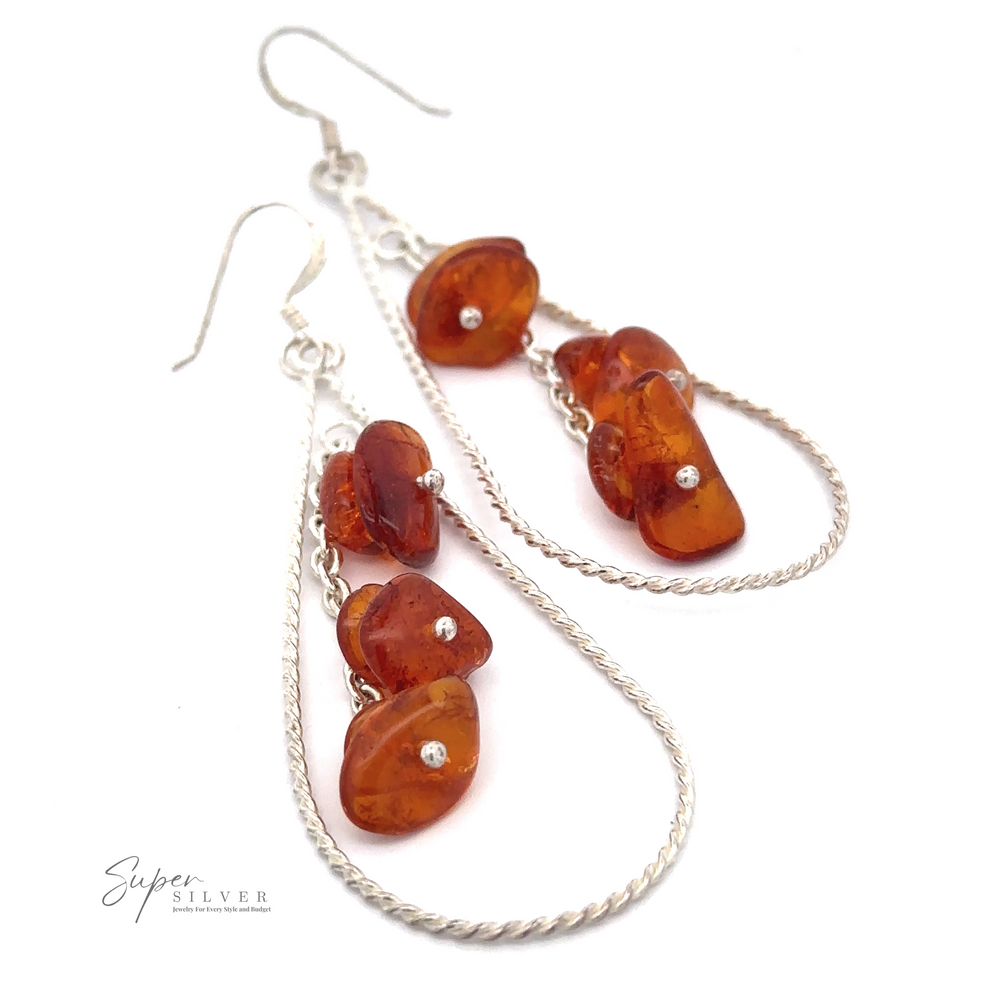 A pair of Teardrop Shaped Dangle Earrings with Amber. The jewelry brand logo "Super Silver" is visible in the bottom left corner.