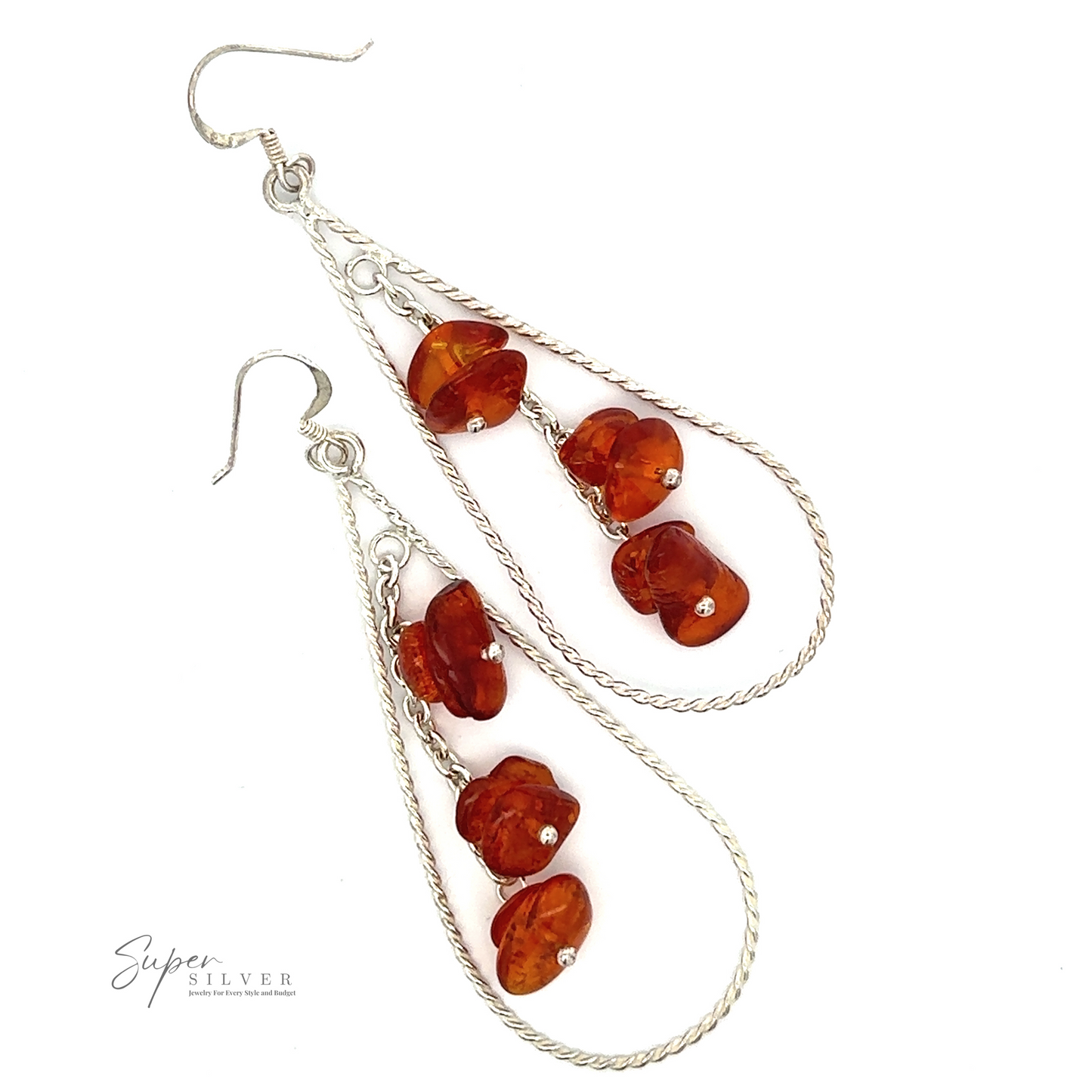
                  
                    A pair of Teardrop Shaped Dangle Earrings with Amber, featuring three polished amber stones each, arranged in a braid-like design. A small logo in the bottom left corner reads "Super Silver." These exquisite tear drop earrings add a touch of elegance to any look.
                  
                