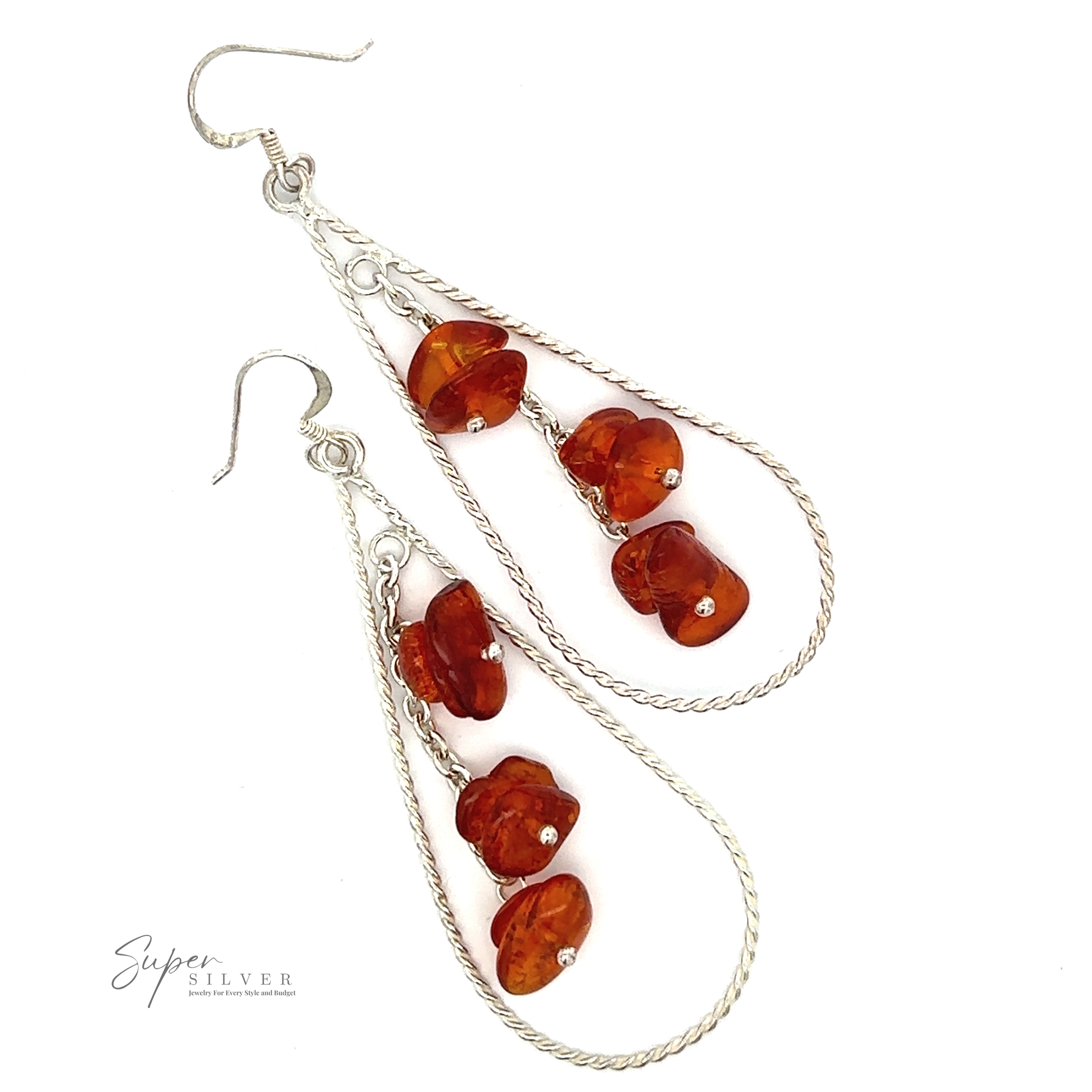 A pair of Teardrop Shaped Dangle Earrings with Amber, featuring three polished amber stones each, arranged in a braid-like design. A small logo in the bottom left corner reads "Super Silver." These exquisite tear drop earrings add a touch of elegance to any look.