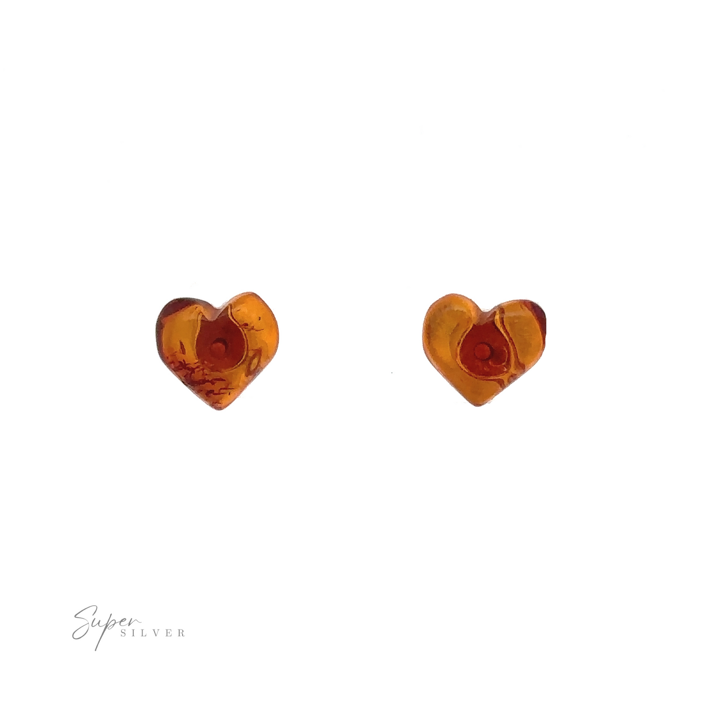 
                  
                    A pair of heart-shaped amber-colored earrings against a white background with "Super Silver" text in the bottom left corner. These stunning Amber Heart Studs exemplify exquisite craftsmanship, perfect for any fashion-forward enthusiast.
                  
                