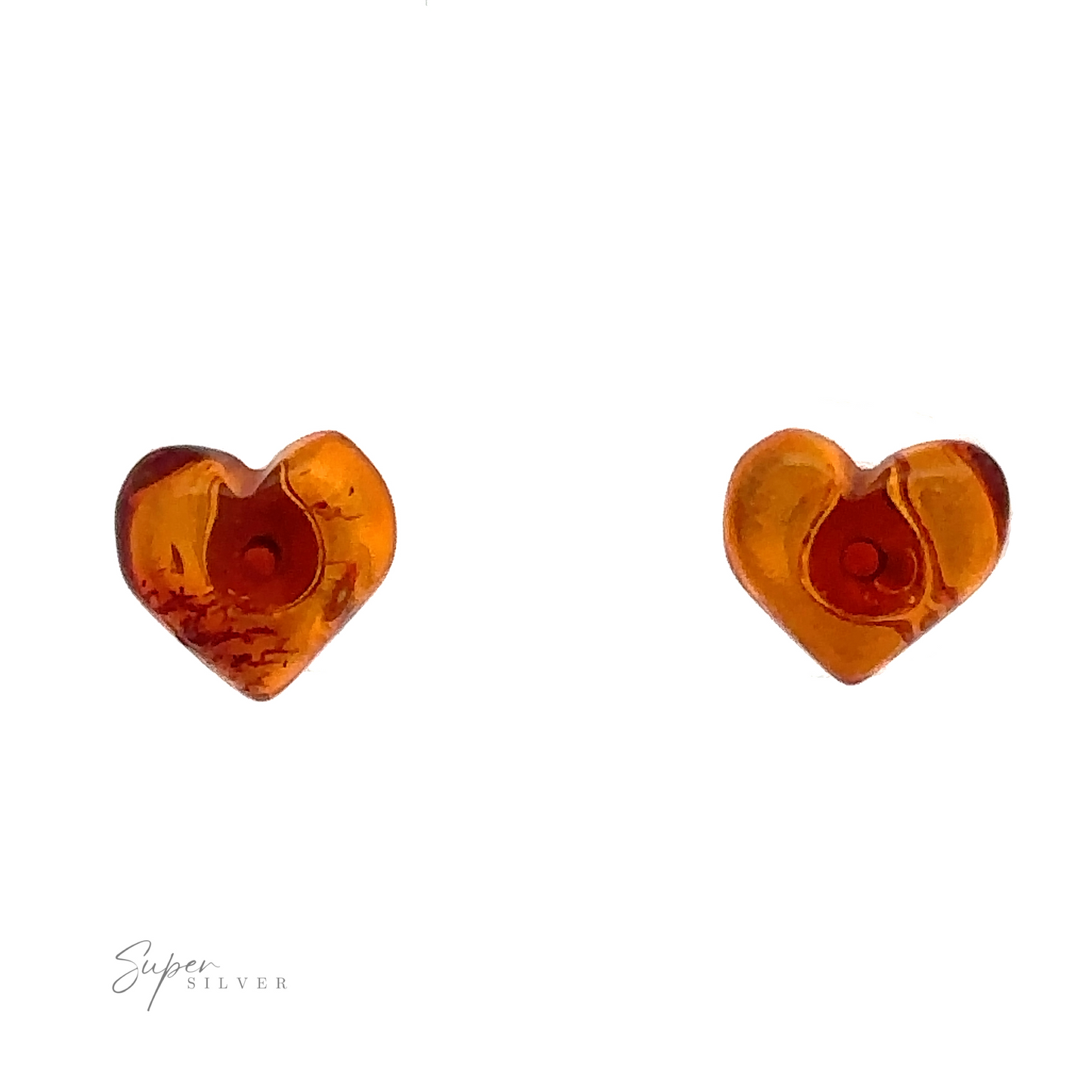 
                  
                    A pair of small heart-shaped amber earrings with dark inclusions, set against a white background. The bottom left corner has the words "Super Silver" written in script font. These Amber Heart Studs are perfect for anyone who appreciates Baltic Amber Jewelry’s timeless elegance.
                  
                