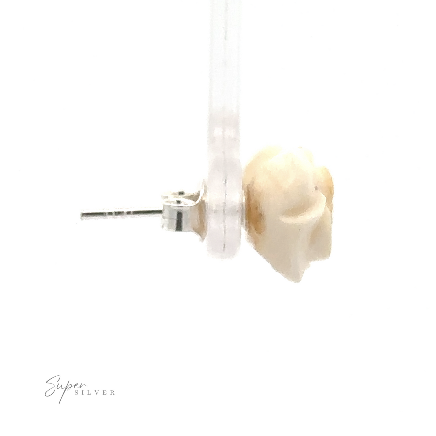 
                  
                    Close-up of a single stud earring with a white rose design, reminiscent of Butterscotch Amber Rose Studs, attached to a transparent stand. The left side includes a pin for fastening. "Super Silver" is written in the bottom left corner, highlighting its quality as part of Sterling Silver Earrings.
                  
                
