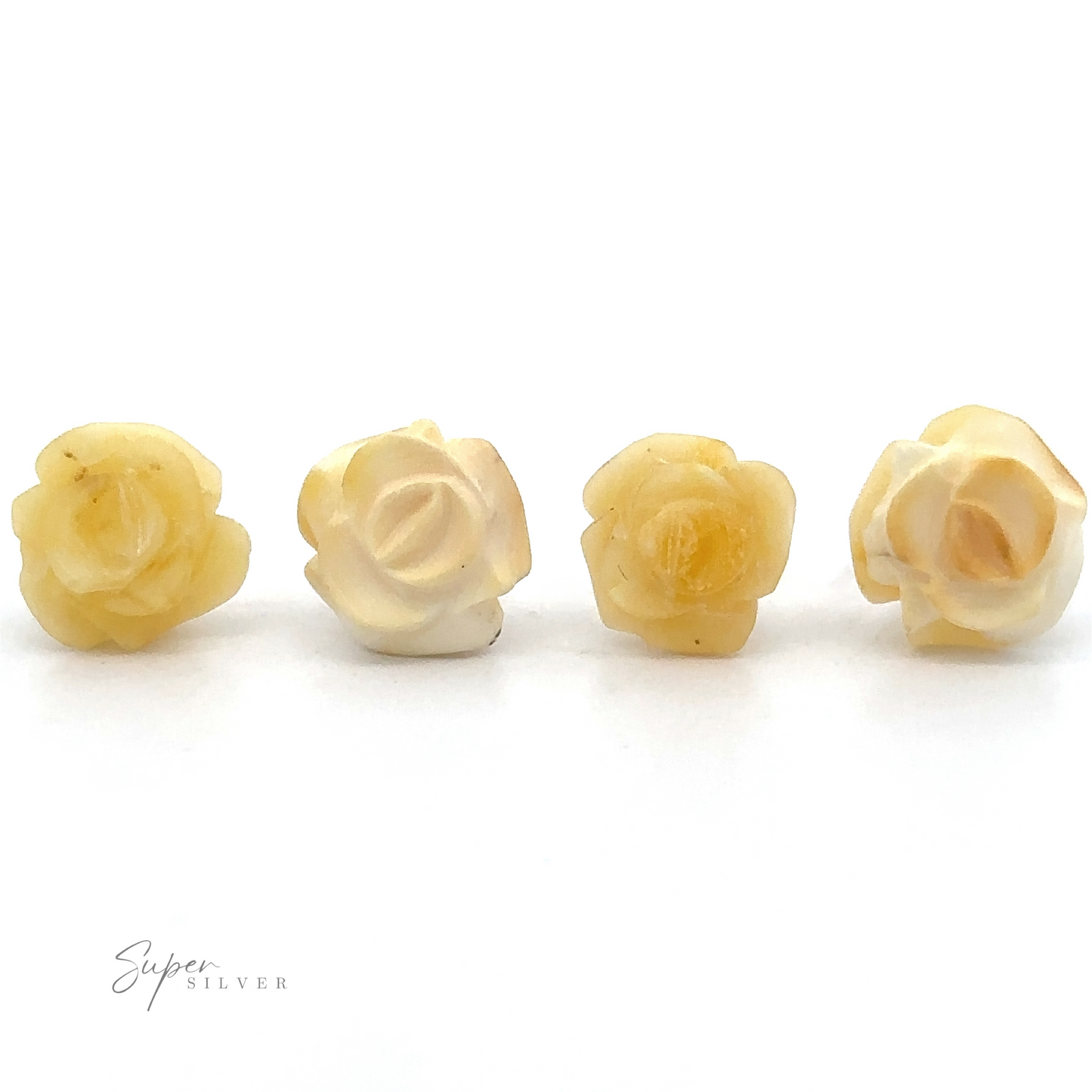 
                  
                    Four small, yellowish-white carved flower beads are arranged in a row on a white background. The image features a logo in the bottom left corner that reads "Super Silver." These delicate Butterscotch Amber Rose Studs bring to mind butterscotch amber jewelry's unique charm.
                  
                