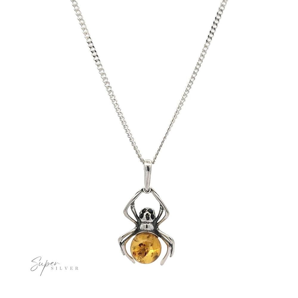 
                  
                    A silver necklace featuring a Baltic Amber Spider Pendant with Onyx Eyes, gripping a round amber stone. The spider's legs encircle the amber, giving it a unique touch of Gothic fashion, while the chain boasts a simple, elegant design.
                  
                