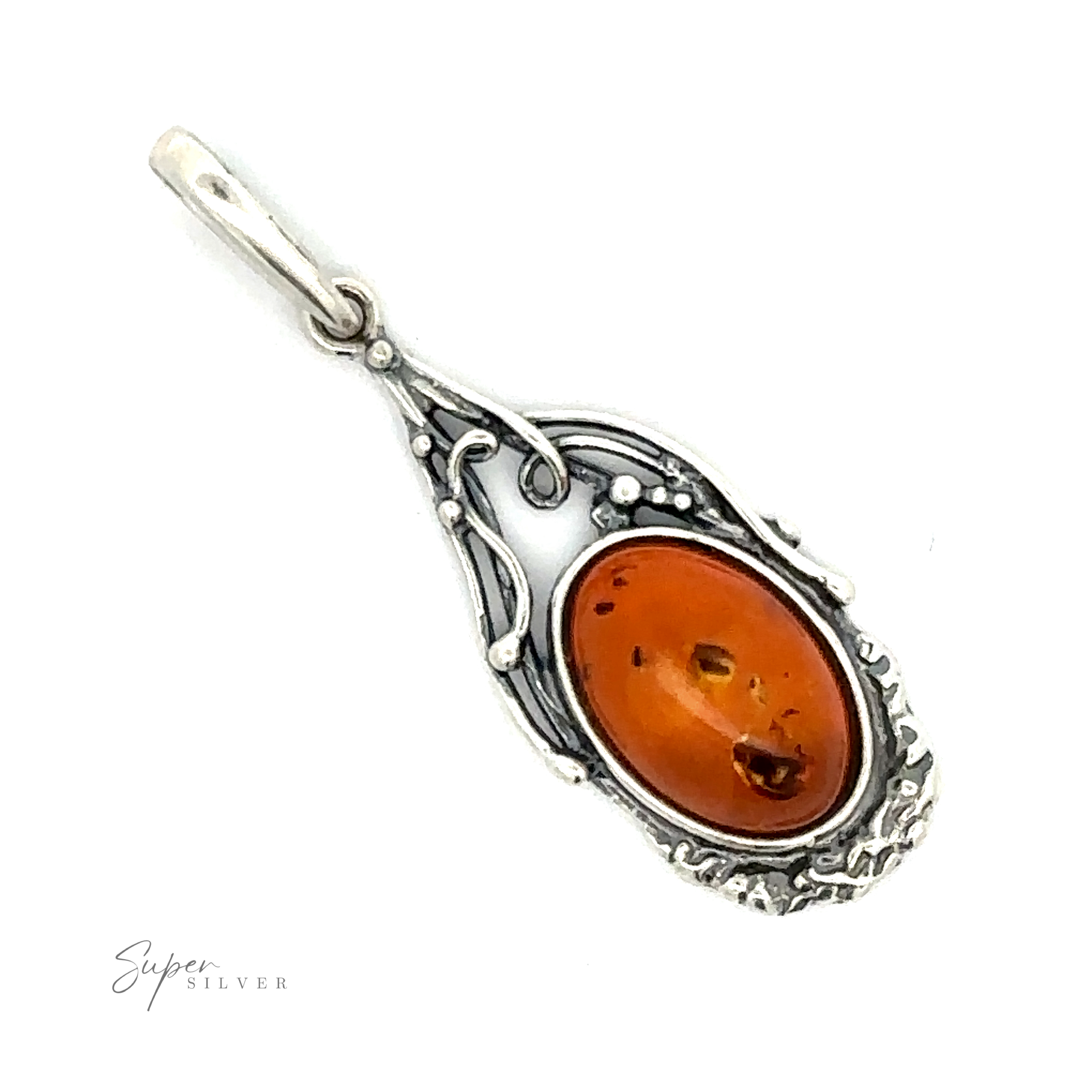 An Antique Style Amber Pendant with an oval Baltic Amber gemstone set in an intricately designed vintage-styled frame, featuring small decorative elements. The word "Super Silver" is lightly visible in the lower left corner.
