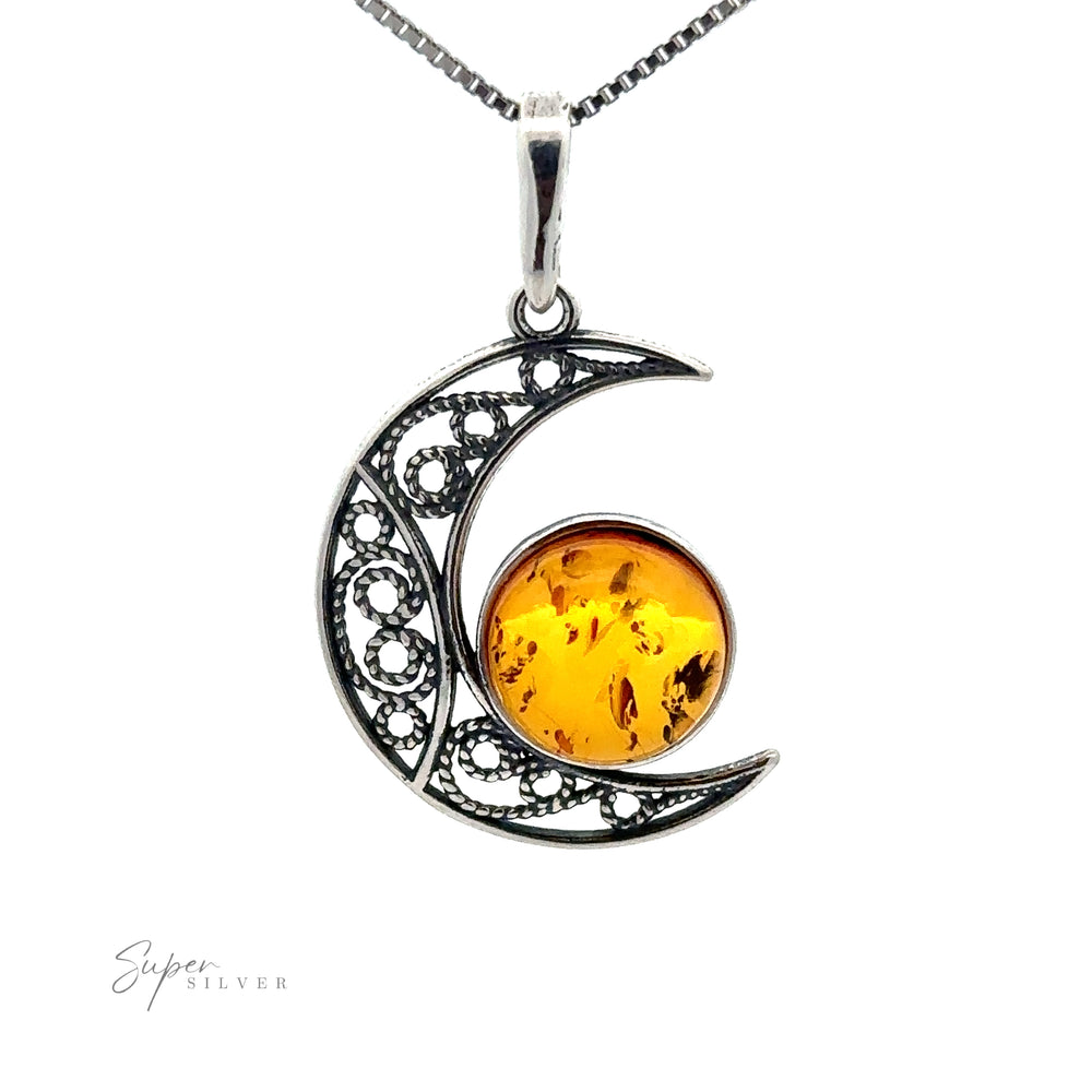 
                  
                    A **Baltic Amber Moon Pendant** features a stunning Baltic amber gemstone at its center.
                  
                