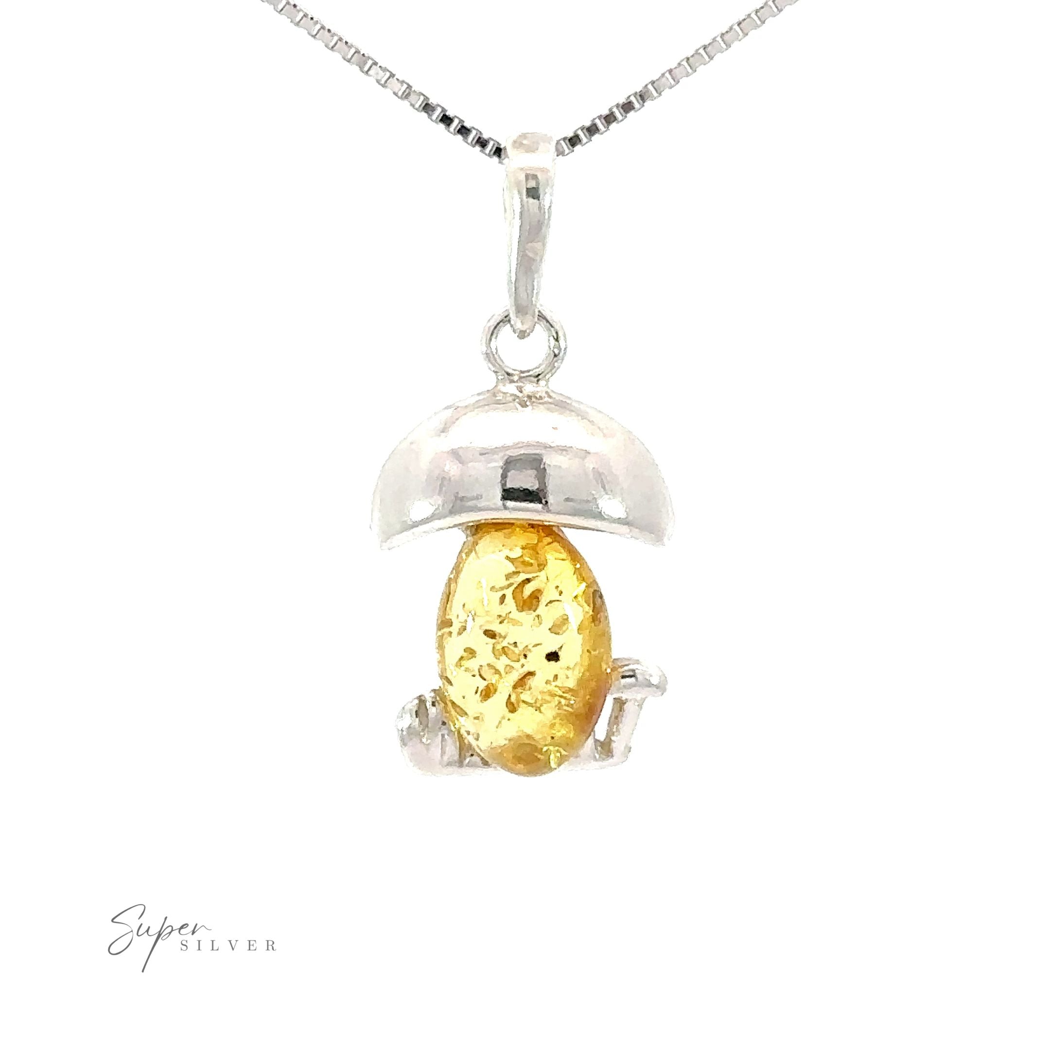 Amber Mushroom Pendant in sterling silver, featuring a funky and unique design inspired by Mother Nature's charm.