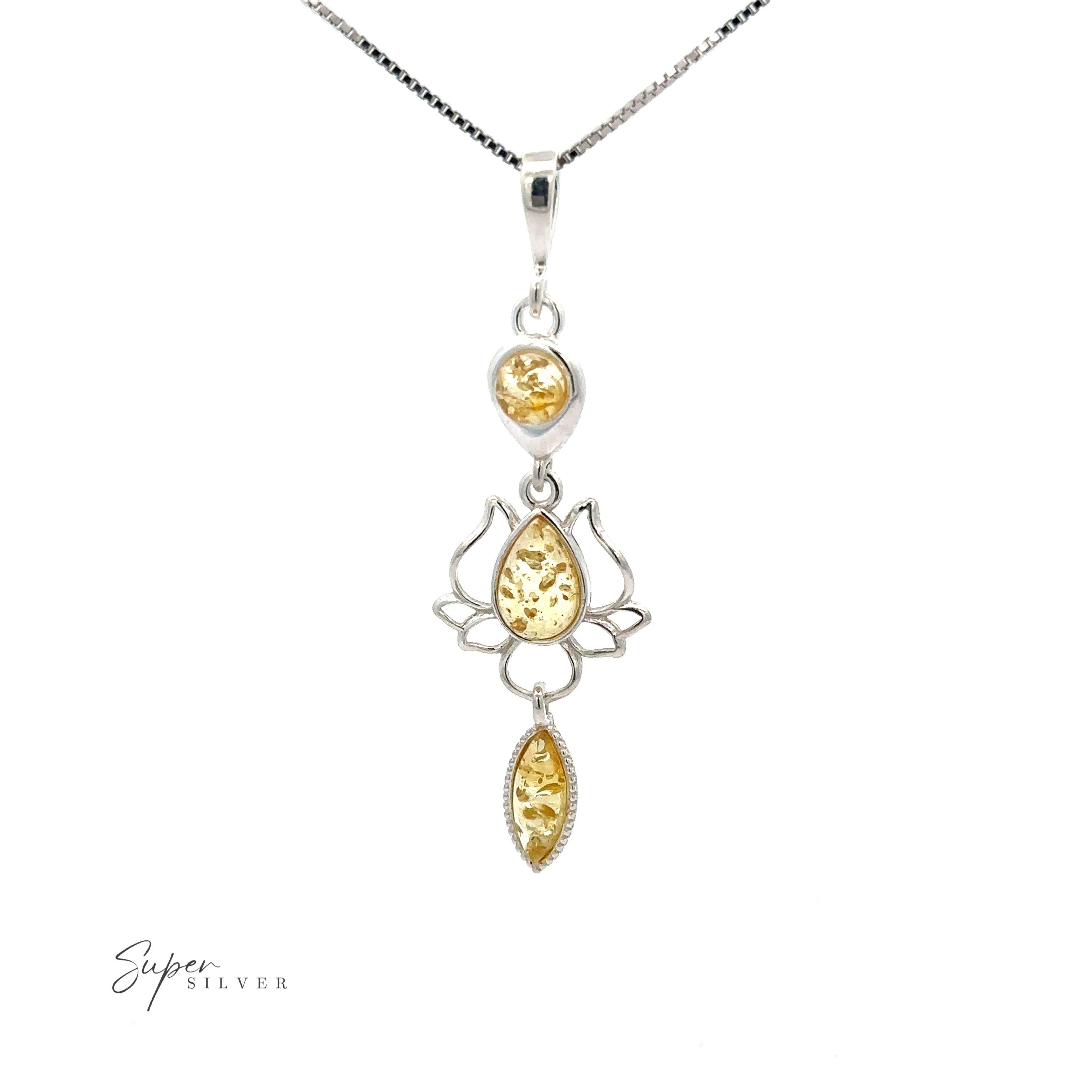 A boho chic Amber Lotus Flower Pendant with a yellow citrine stone.