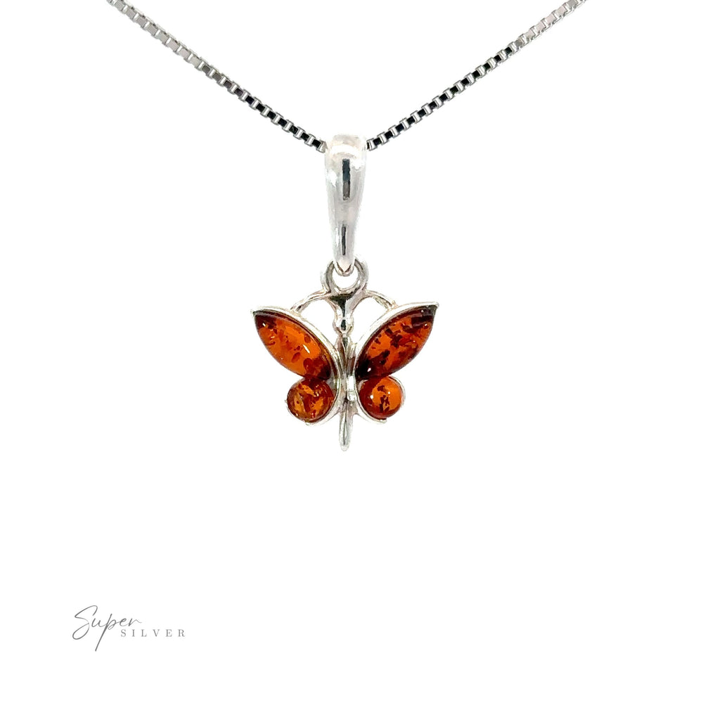 Small Amber Butterfly Pendants, exuding the exquisite beauty of amber, in elegant sterling silver.