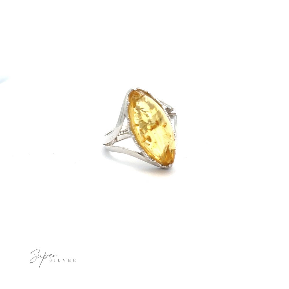 
                  
                    A Marquise-Shaped Baltic Amber Adjustable Ring featuring a large, marquise-shaped amber gemstone, displayed on a white background. The ring boasts a simple, elegant band design.
                  
                