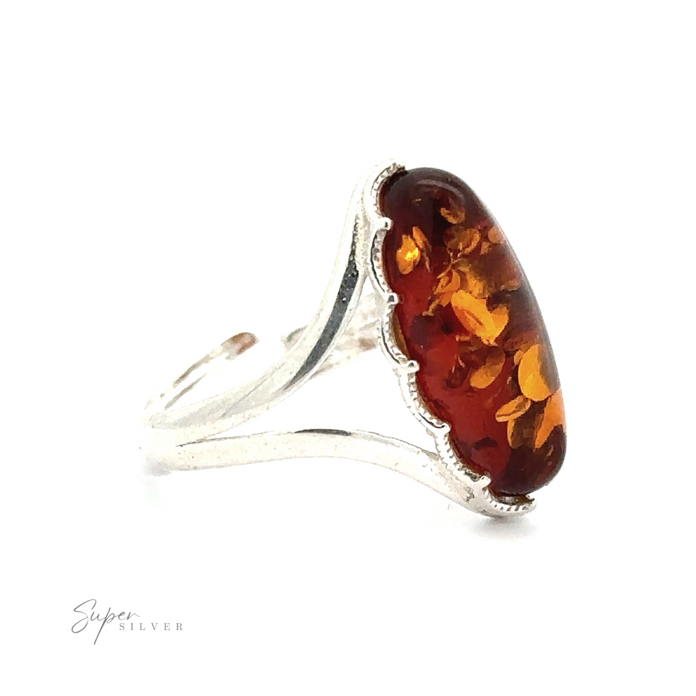 
                  
                    A Marquise-Shaped Baltic Amber Adjustable Ring featuring a decorative setting and an adjustable band.
                  
                