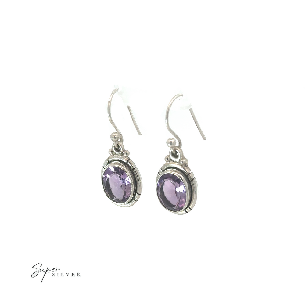 
                  
                    A pair of Oval Labradorite and Amethyst Dangle Earrings displayed against a white background.
                  
                
