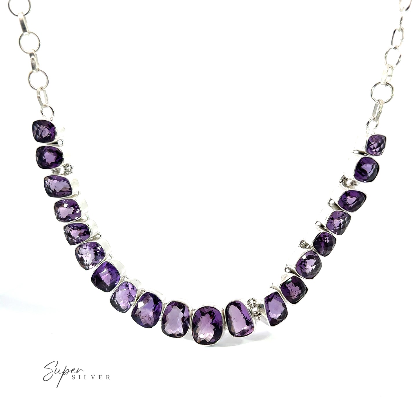 
                  
                    Statement Gemstone Necklace featuring a series of oval purple amethyst gemstones set in silver linked together, with "Super Silver" branding in the bottom-left corner.
                  
                