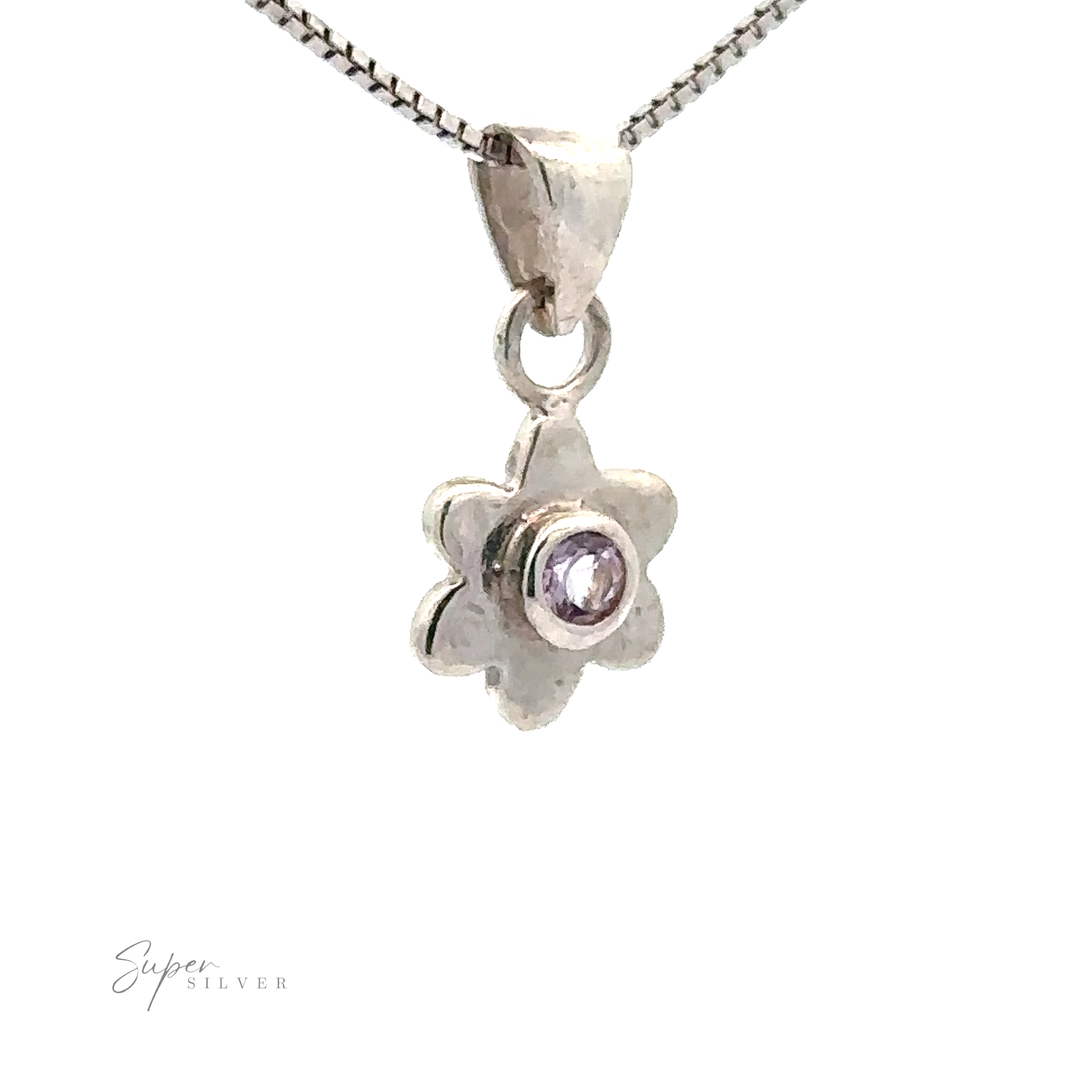 A stunning Tiny Gemstone Flower Pendant hanging on a delicate chain necklace against a pristine white background.