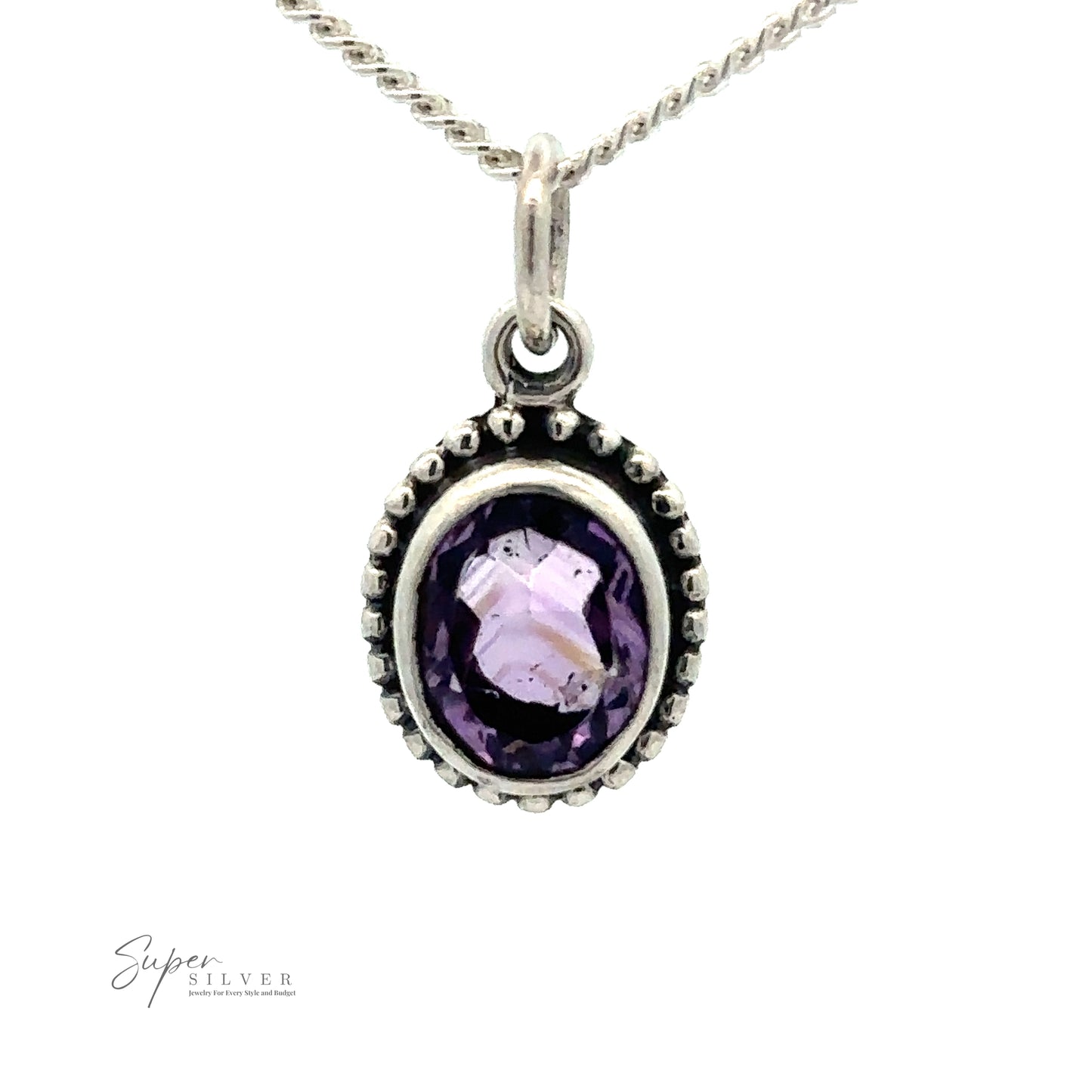 An Oval Faceted Amethyst Pendant featuring a small, oval-shaped amethyst gemstone encased in a detailed silver bezel setting. This calming accessory is completed with a twisted rope chain design.