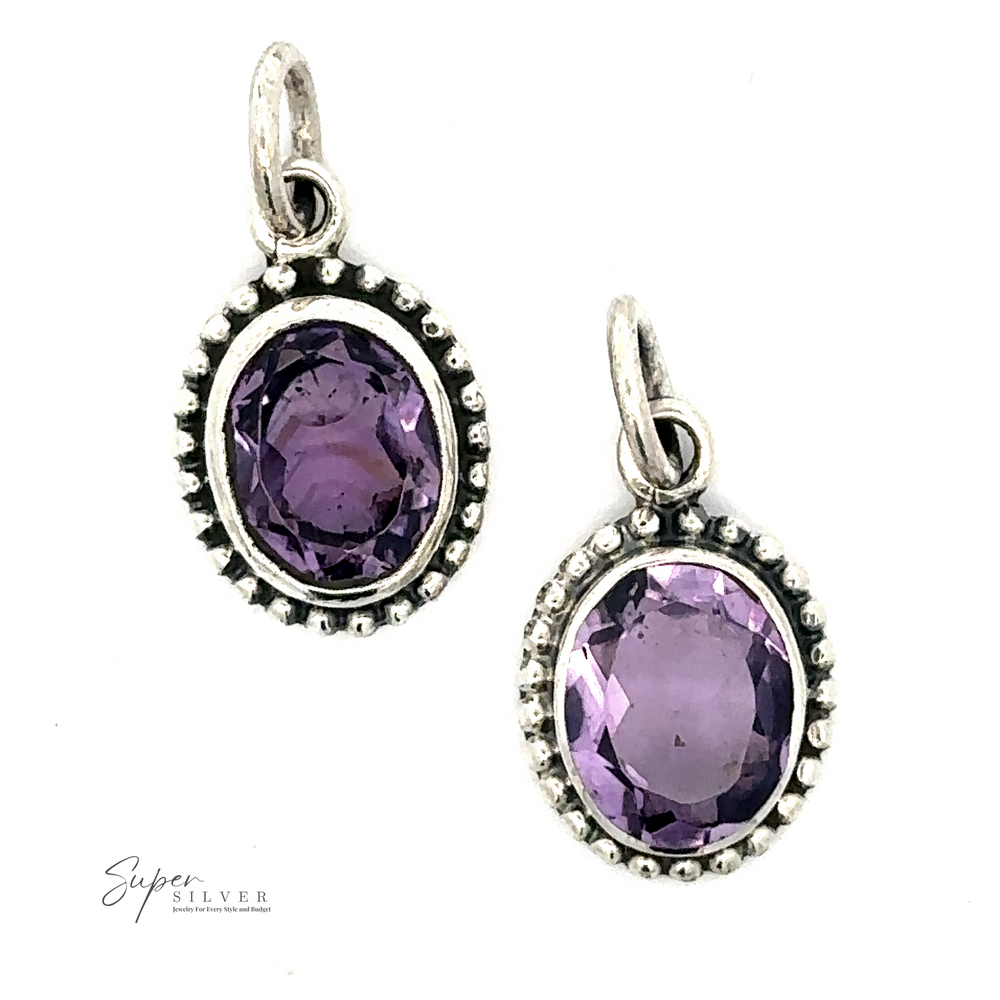 Two Oval Faceted Amethyst Pendants set in sterling silver with decorative bead detailing around the edges. As a calming accessory, the soft purple hues provide tranquility. The brand name 