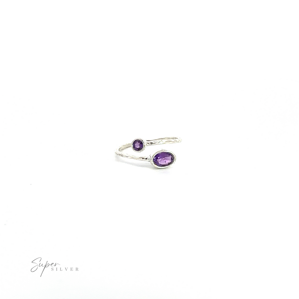 
                  
                    .925 Sterling Silver Textured Adjustable Band with Adorned Purple Gemstones.
                  
                