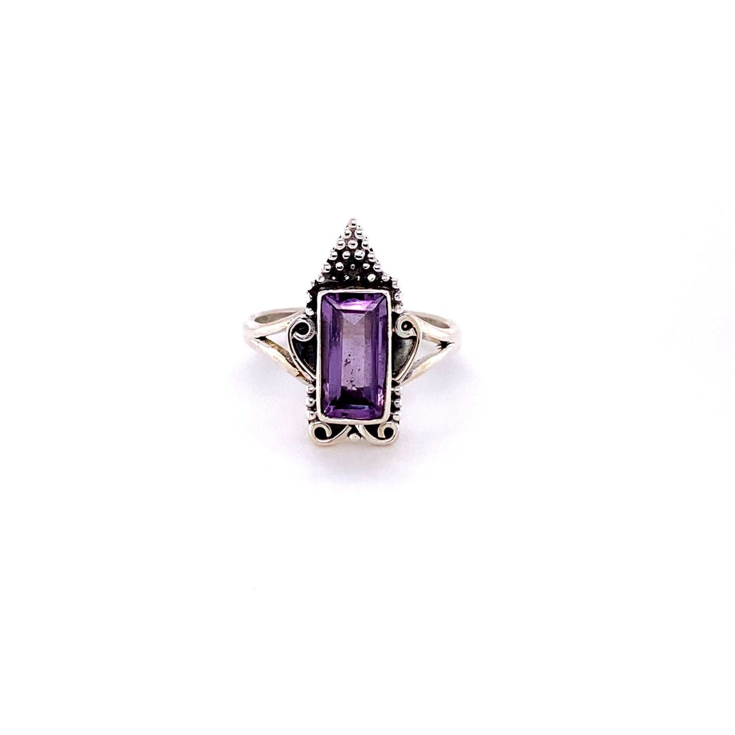 
                  
                    A silver, Bohemian Princess Ring with intricate detailing, featuring a rectangular amethyst at its center.
                  
                