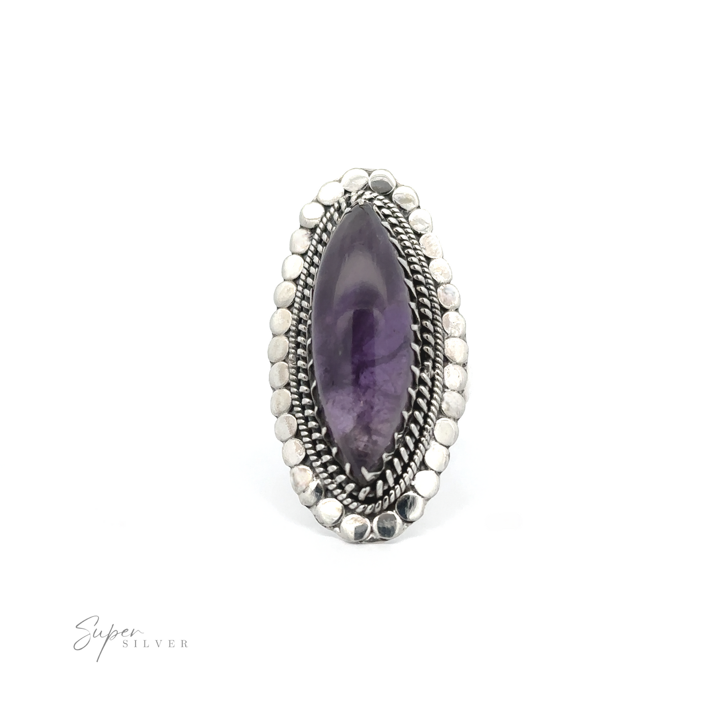 
                  
                    An oval-shaped purple gemstone set in a decorated silver ring. The ring features detailed silverwork with a pattern of small silver dots surrounding the large gemstone, embodying the spirit of Bohemian jewelry. Text reads "Statement Marquise Shaped Gemstone Ring.
                  
                