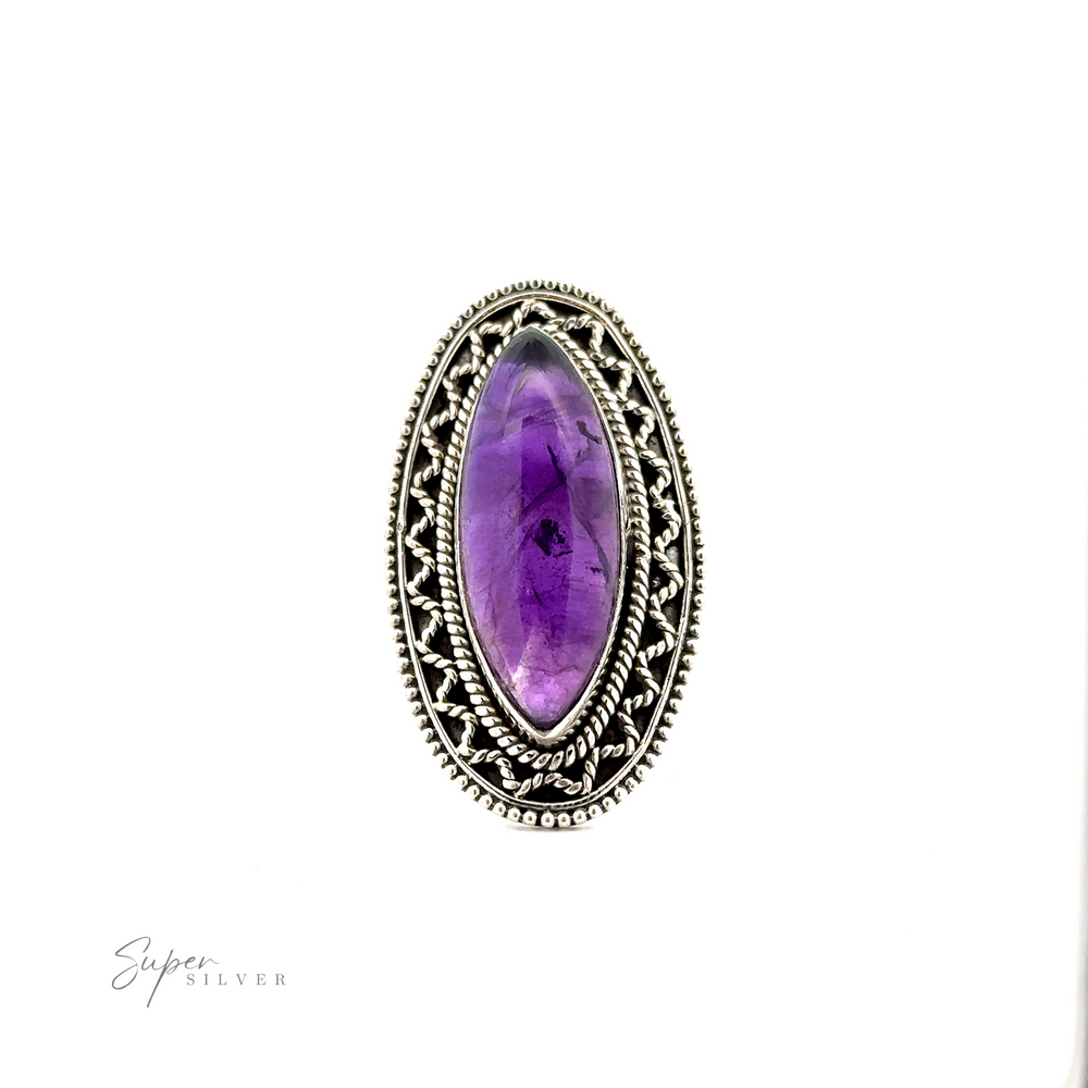 
                  
                    An oval-shaped silver ring with an intricate design features a purple gemstone at its center, giving it a Bohemian twist. The Marquise Shaped Gemstone Ring With Vintage Shield Border is displayed against a white background with "Super Silver" text in the bottom left corner.
                  
                