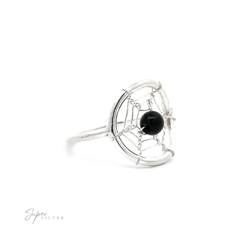 
                  
                    A Wire Dreamcatcher Ring with Bead featuring a black bead encased in an intricate wire-wrapped design, displayed on a white background.
                  
                