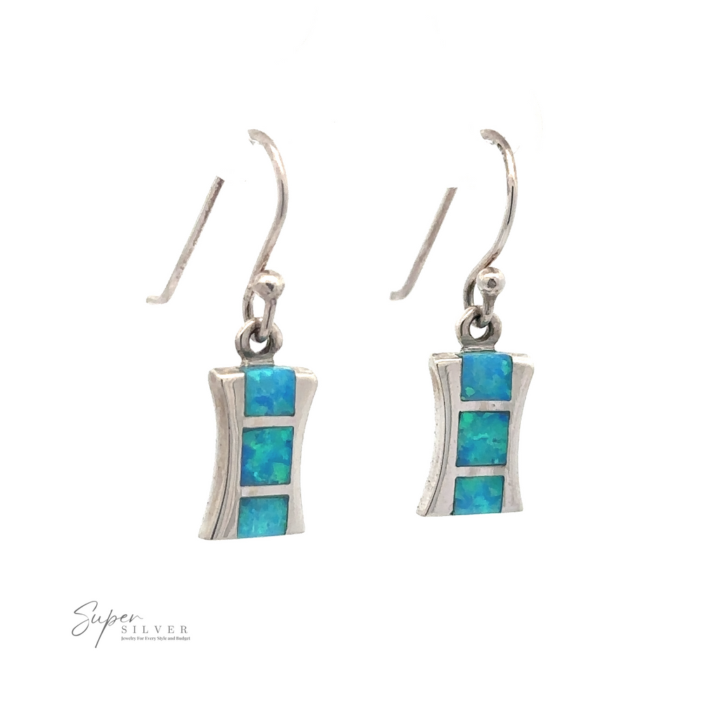 A pair of Freeform Lab-Created Opal Earrings featuring three blue-green lab-created opal inlays per earring. They have fishhook backings and a slightly curved rectangular design. The lower left displays the "Super Silver" logo.