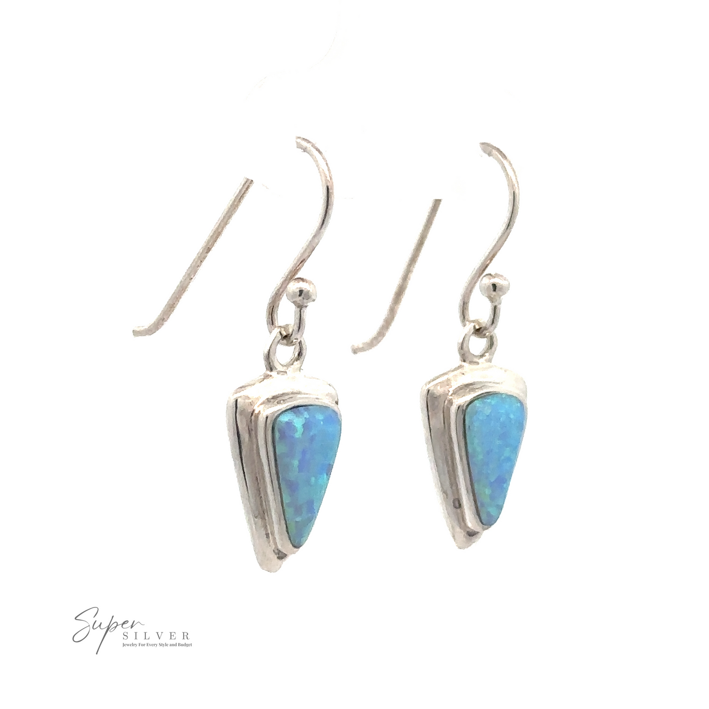 Silver hook earrings with blue triangular stones. These elegant Blue Created Opal Triangle Earrings feature the "Super Silver" logo in the bottom corner.