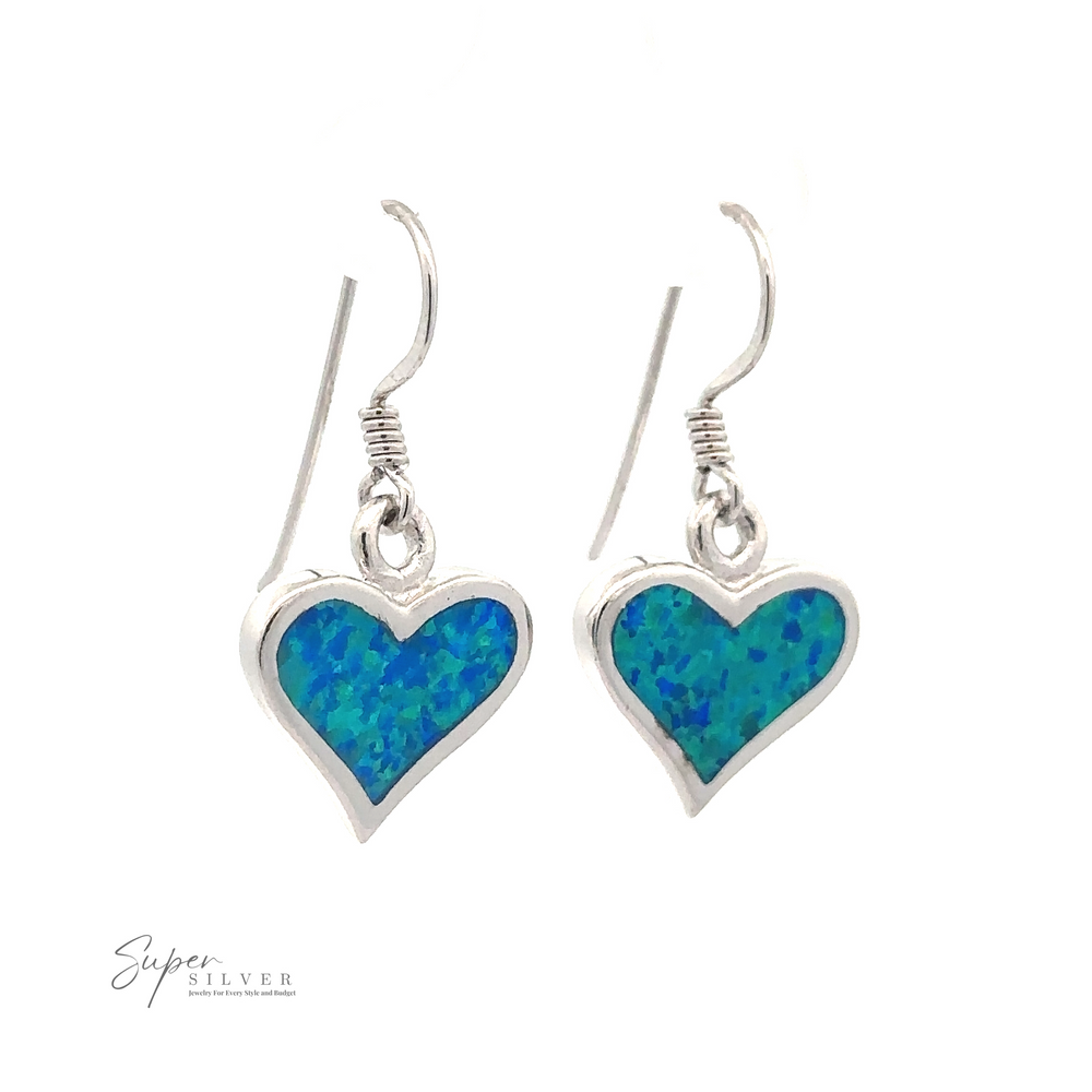A pair of *Lab-Created Opal Heart Earrings* with blue-green lab-created opal insets and silver hooks. The brand "Super Silver" is visible in the bottom left corner.